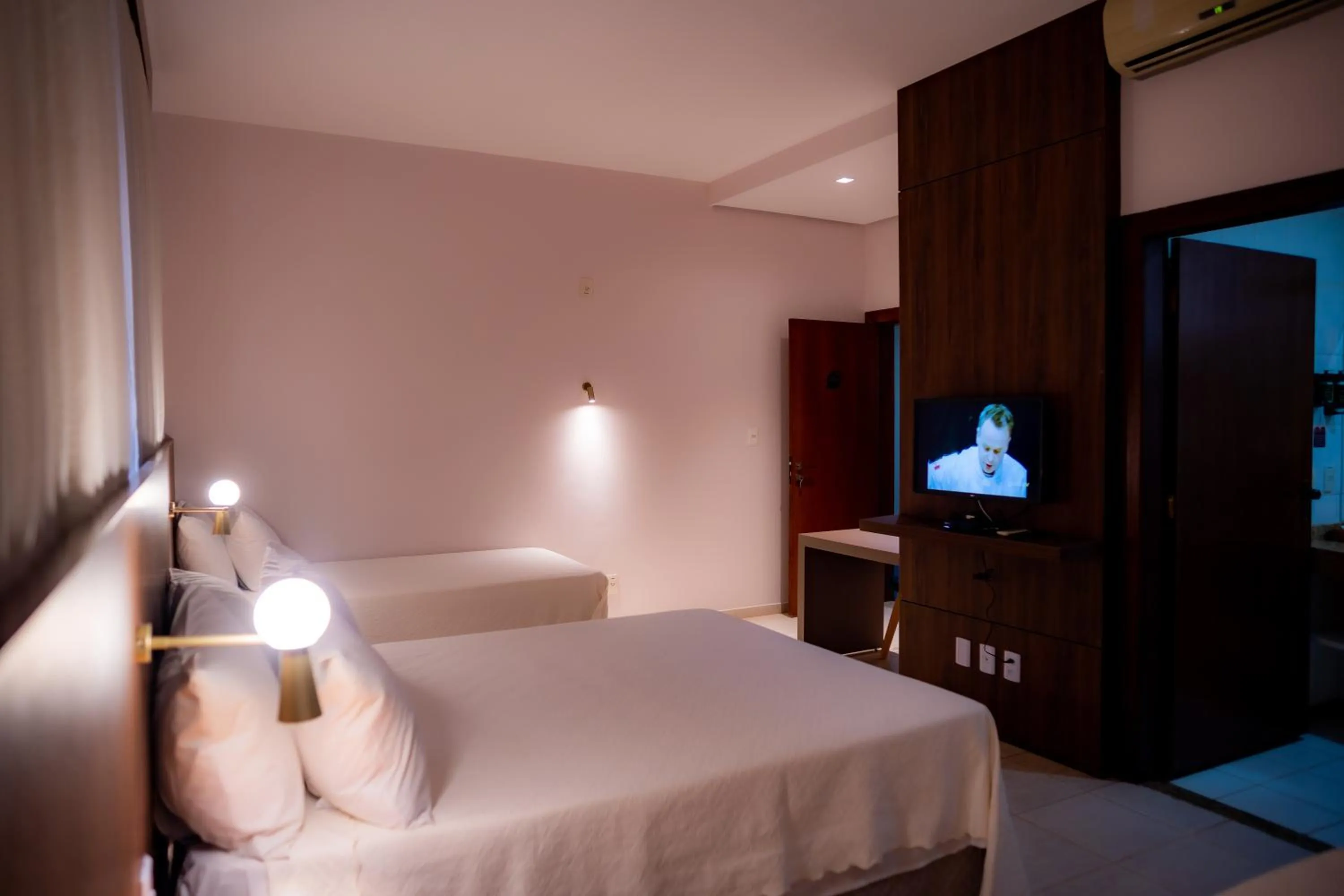 Bed in Hotel Santos Dumont