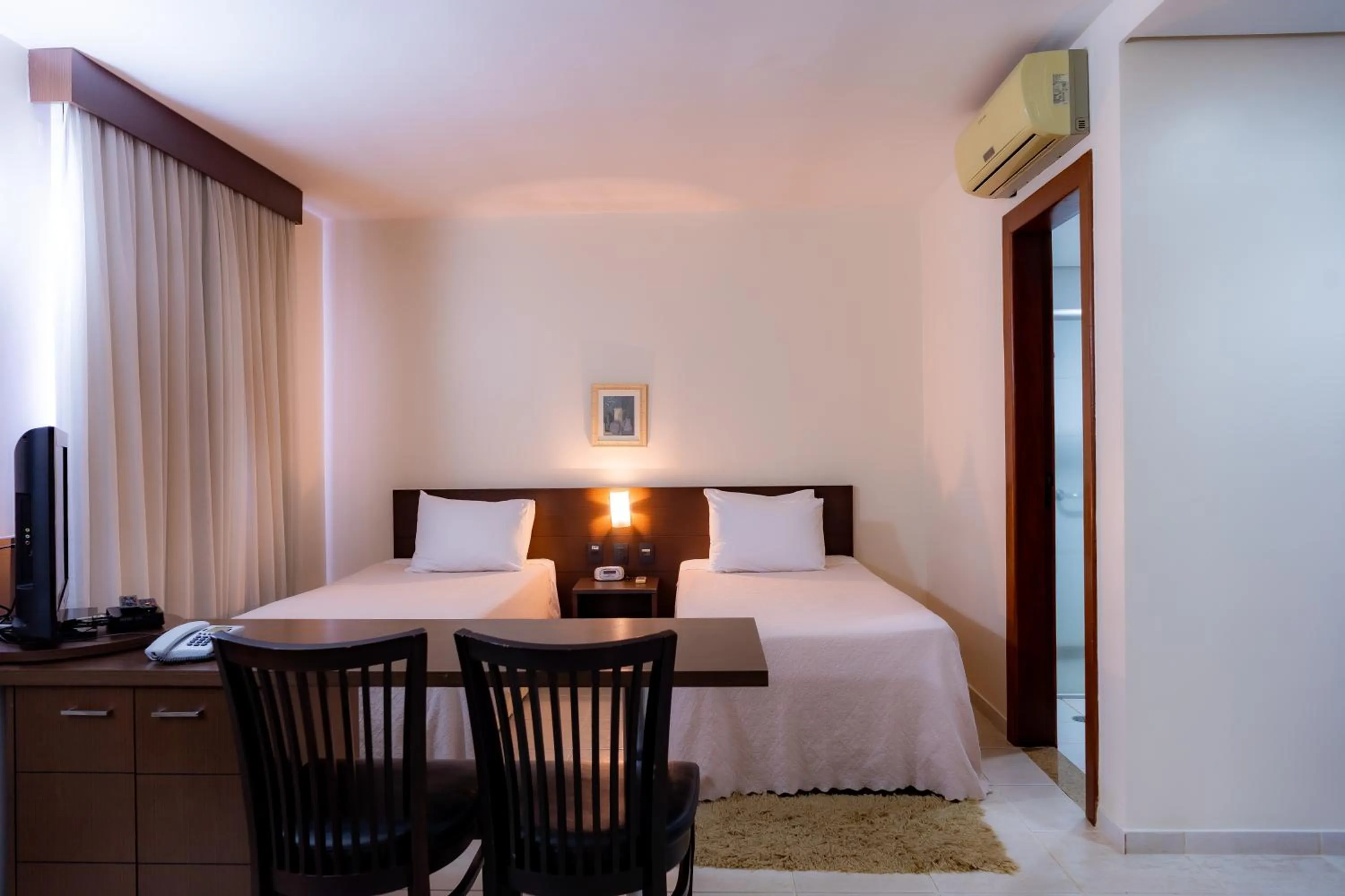 Bed in Hotel Santos Dumont