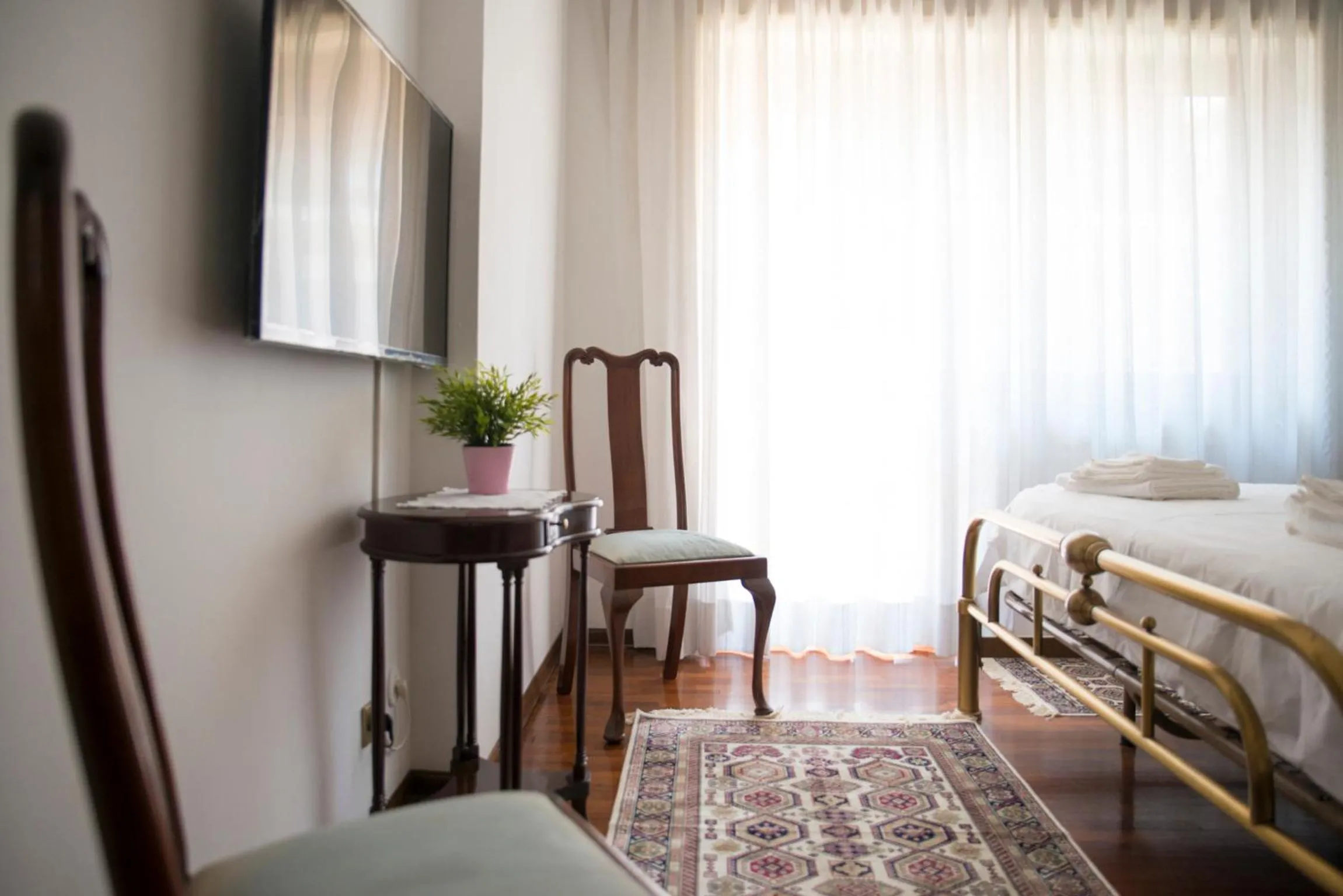 Seating area, Bed in Plumbird Boutique & Apartment