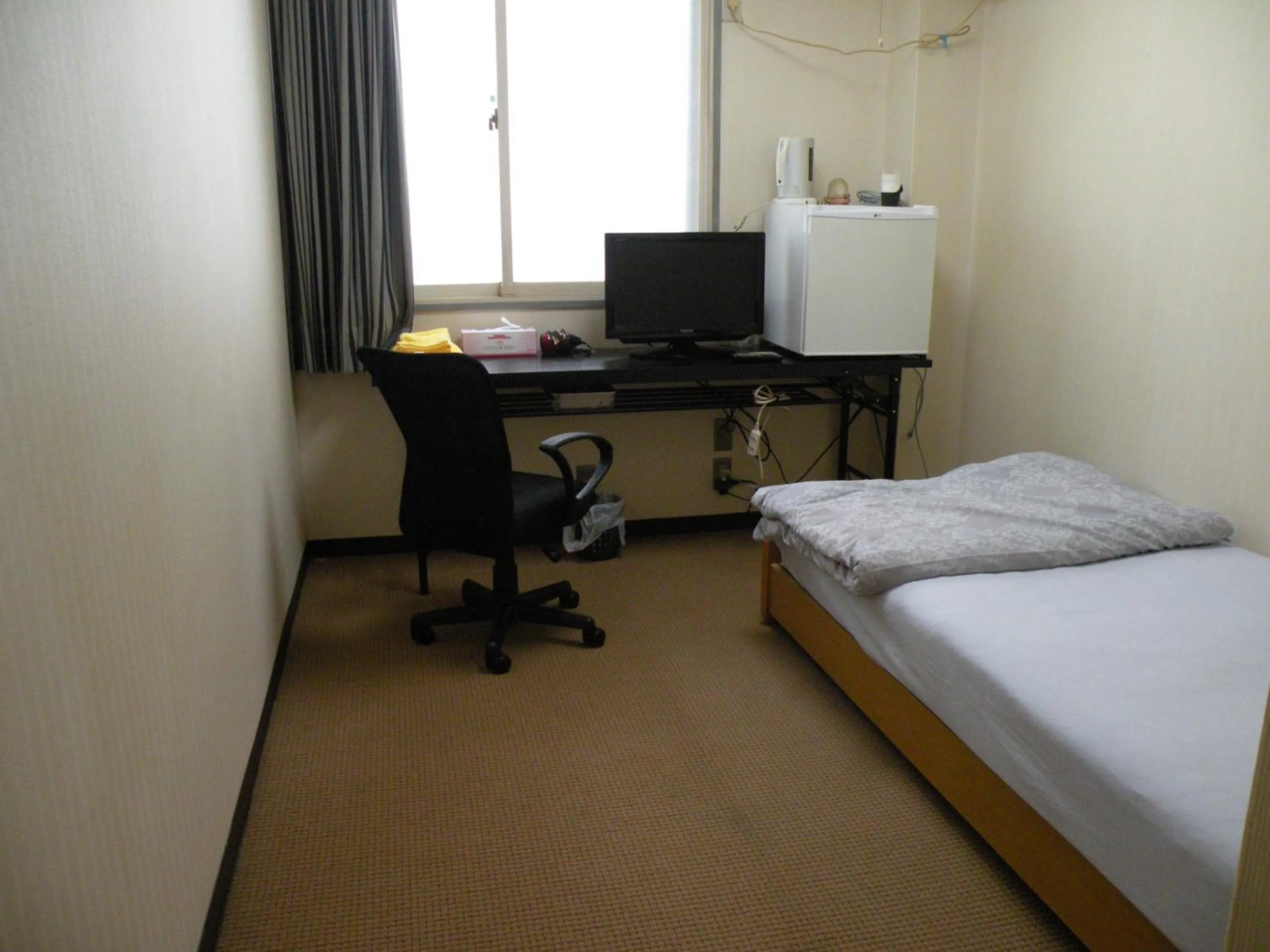 Bed in Business Hotel Minshuku Minato
