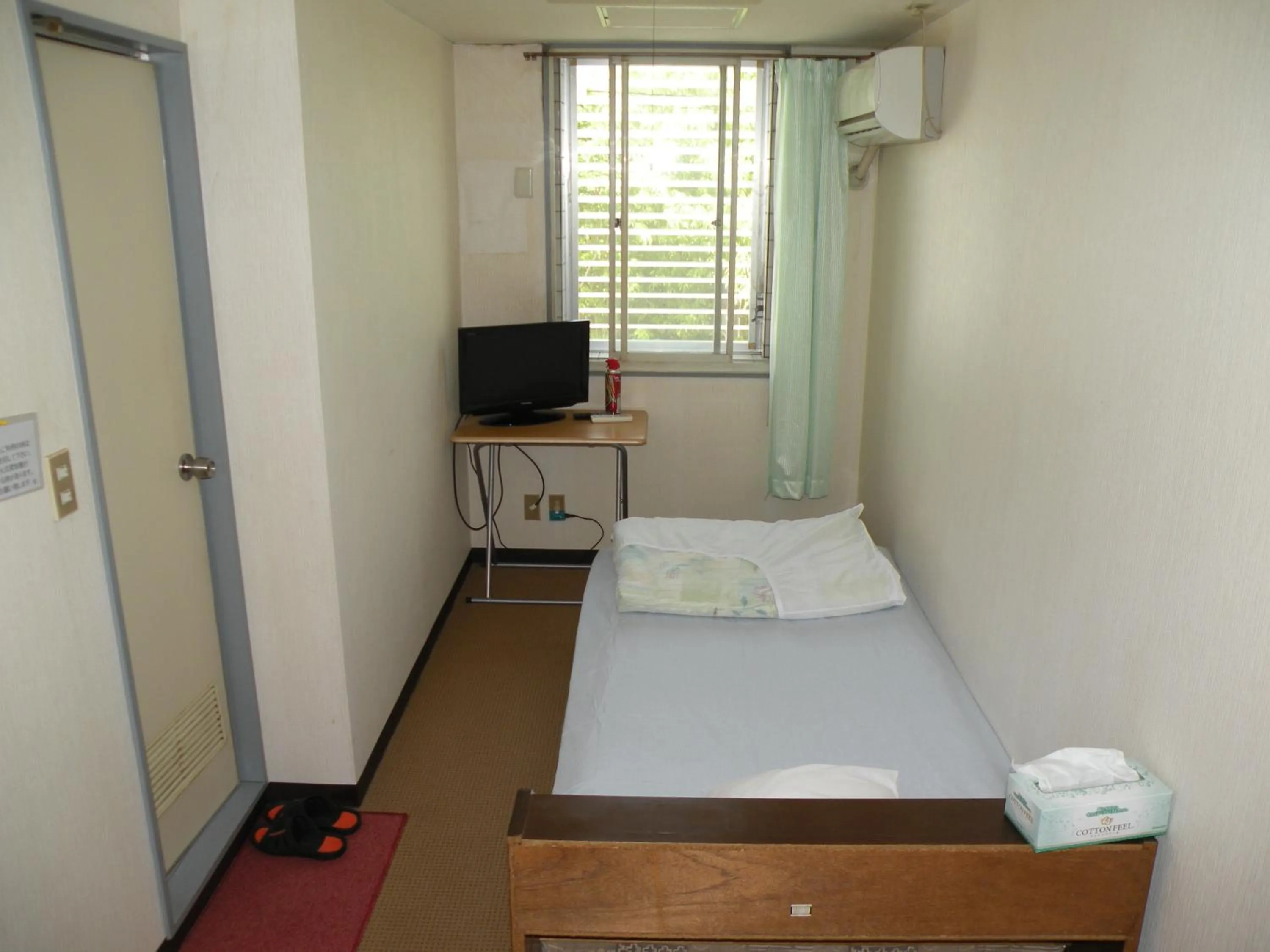 Bed in Business Hotel Minshuku Minato