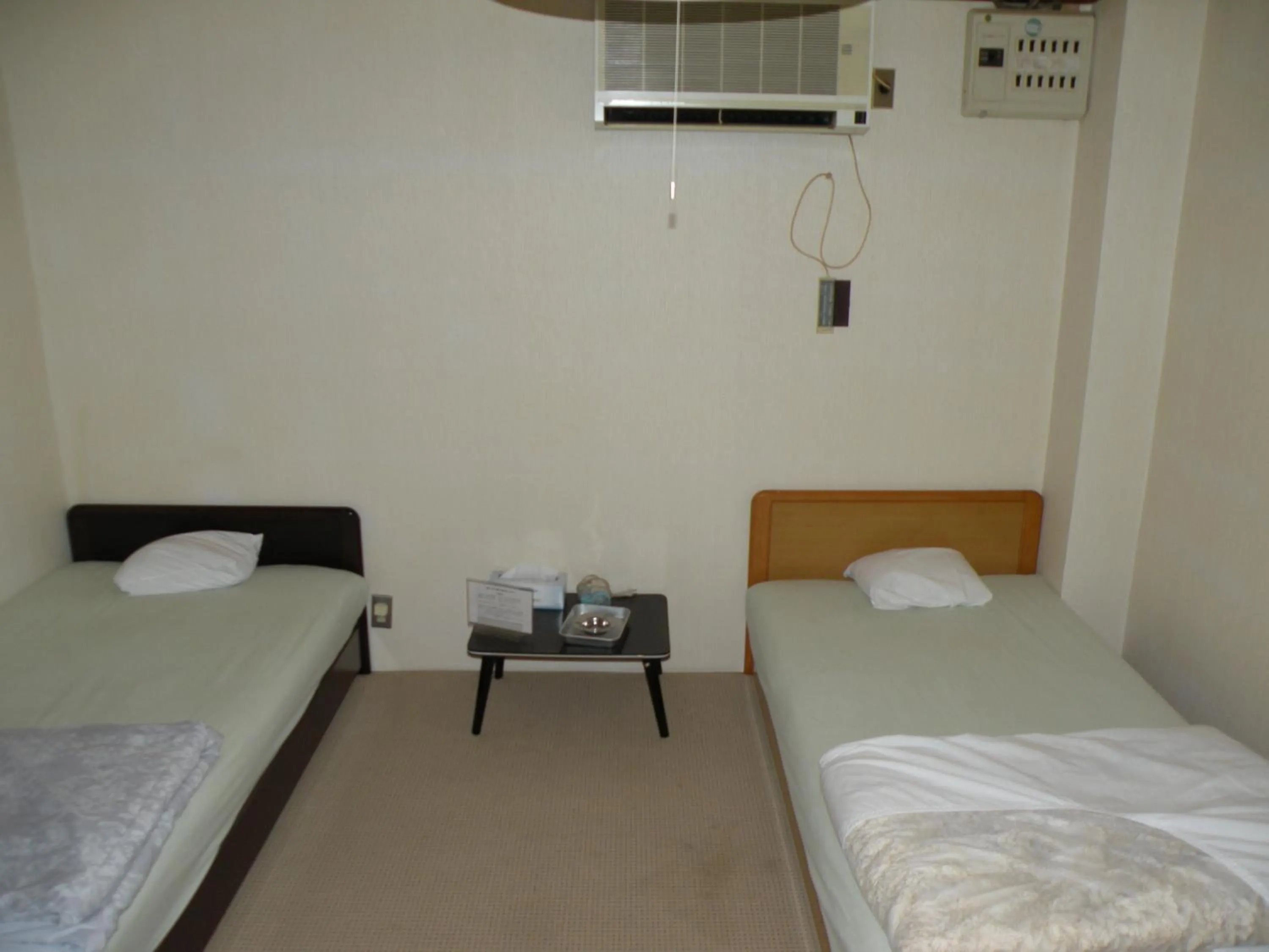 Bed in Business Hotel Minshuku Minato