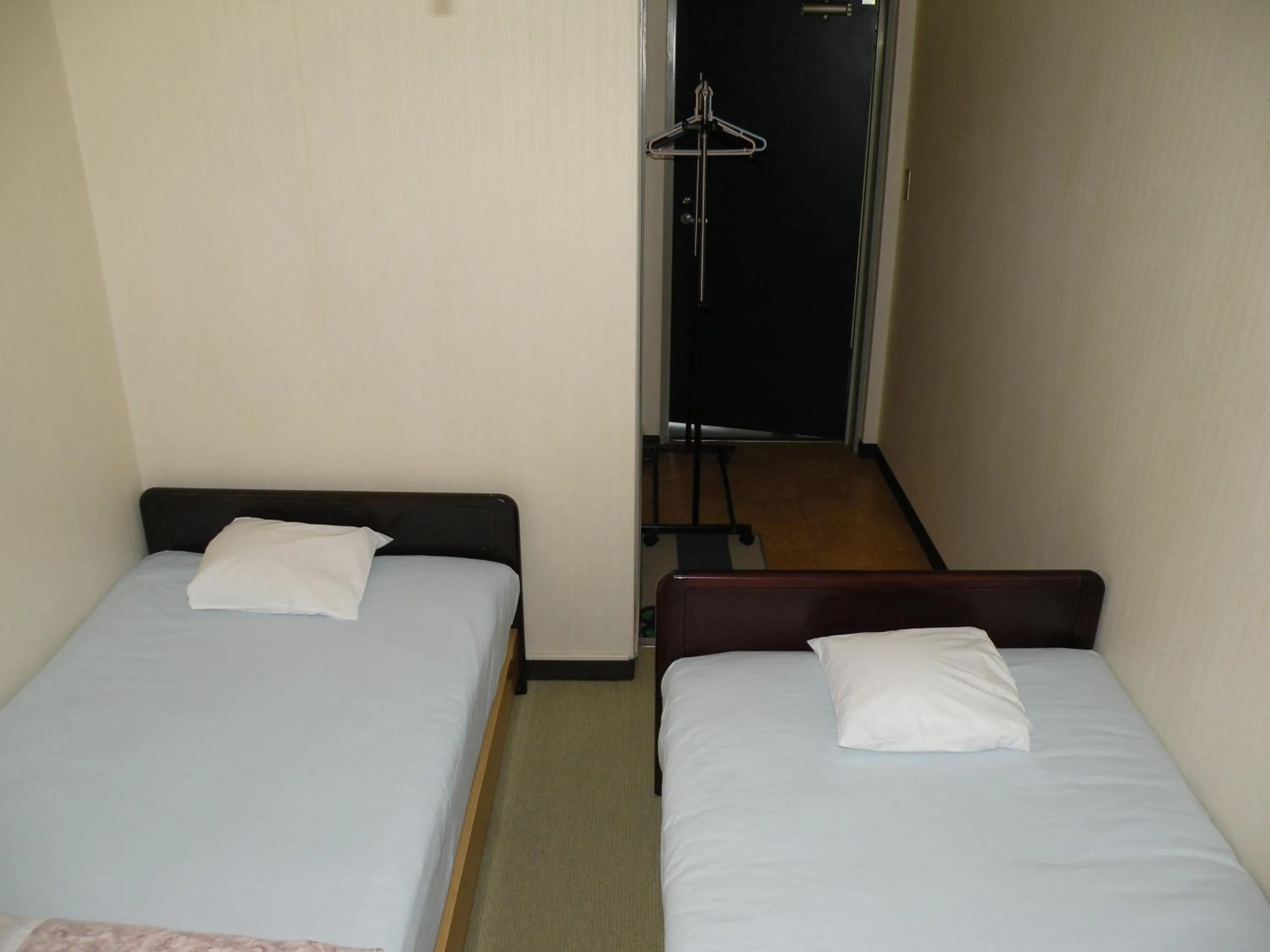 Bed in Business Hotel Minshuku Minato
