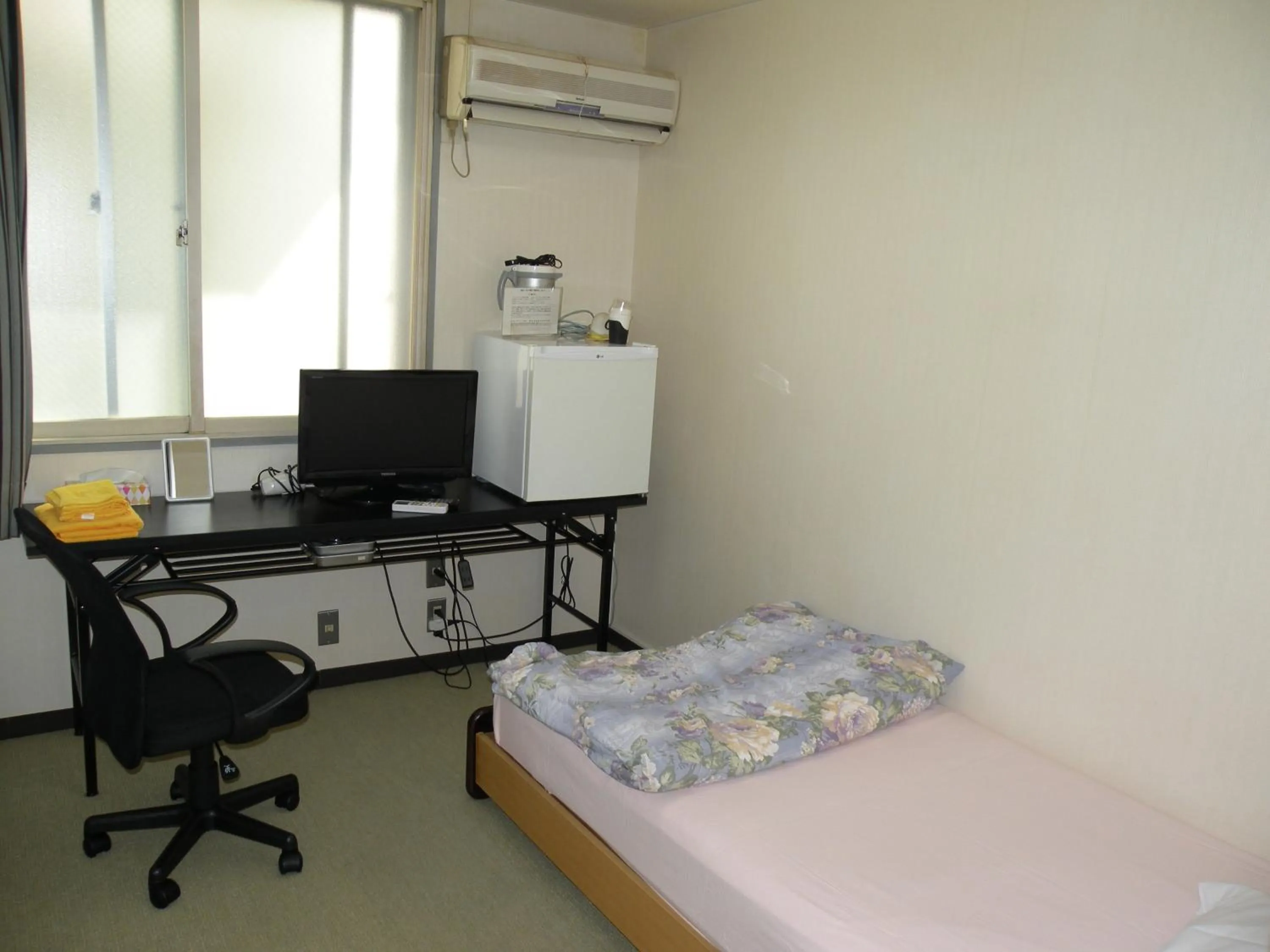 Bed in Business Hotel Minshuku Minato