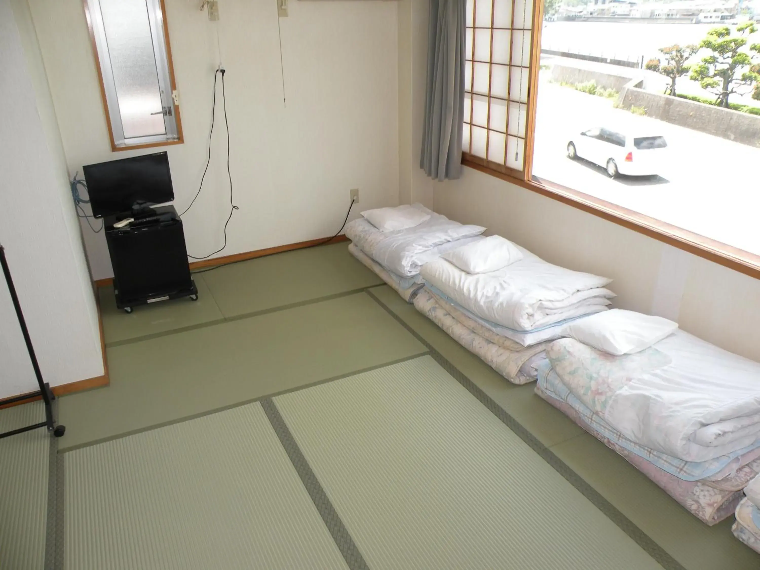 Quadruple Room with Private Bathroom in Business Hotel Minshuku Minato Quadruple Room with Private Bathroom in Business Hotel Minshuku Minato