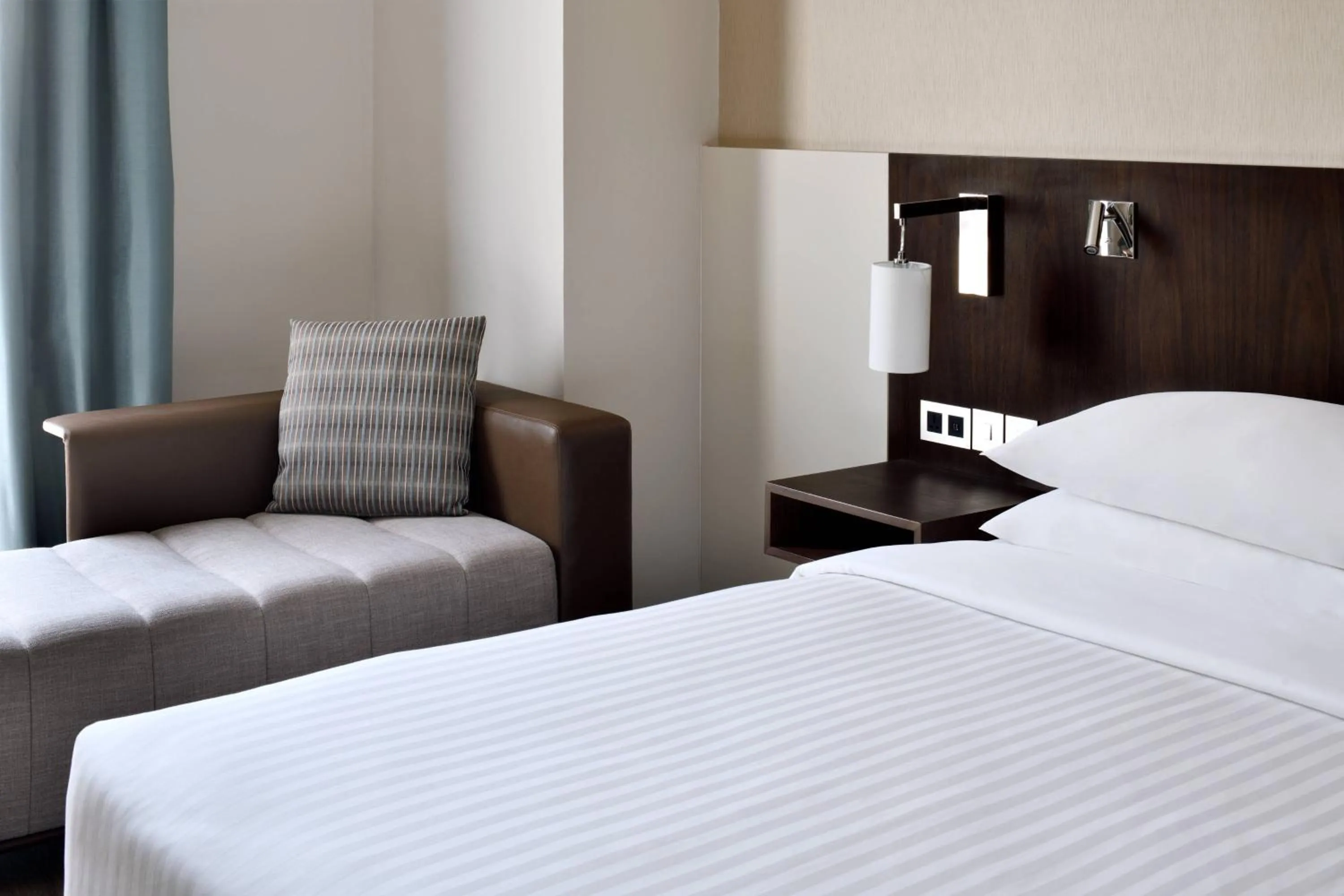 Photo of the whole room, Bed in Riyadh Airport Marriott Hotel