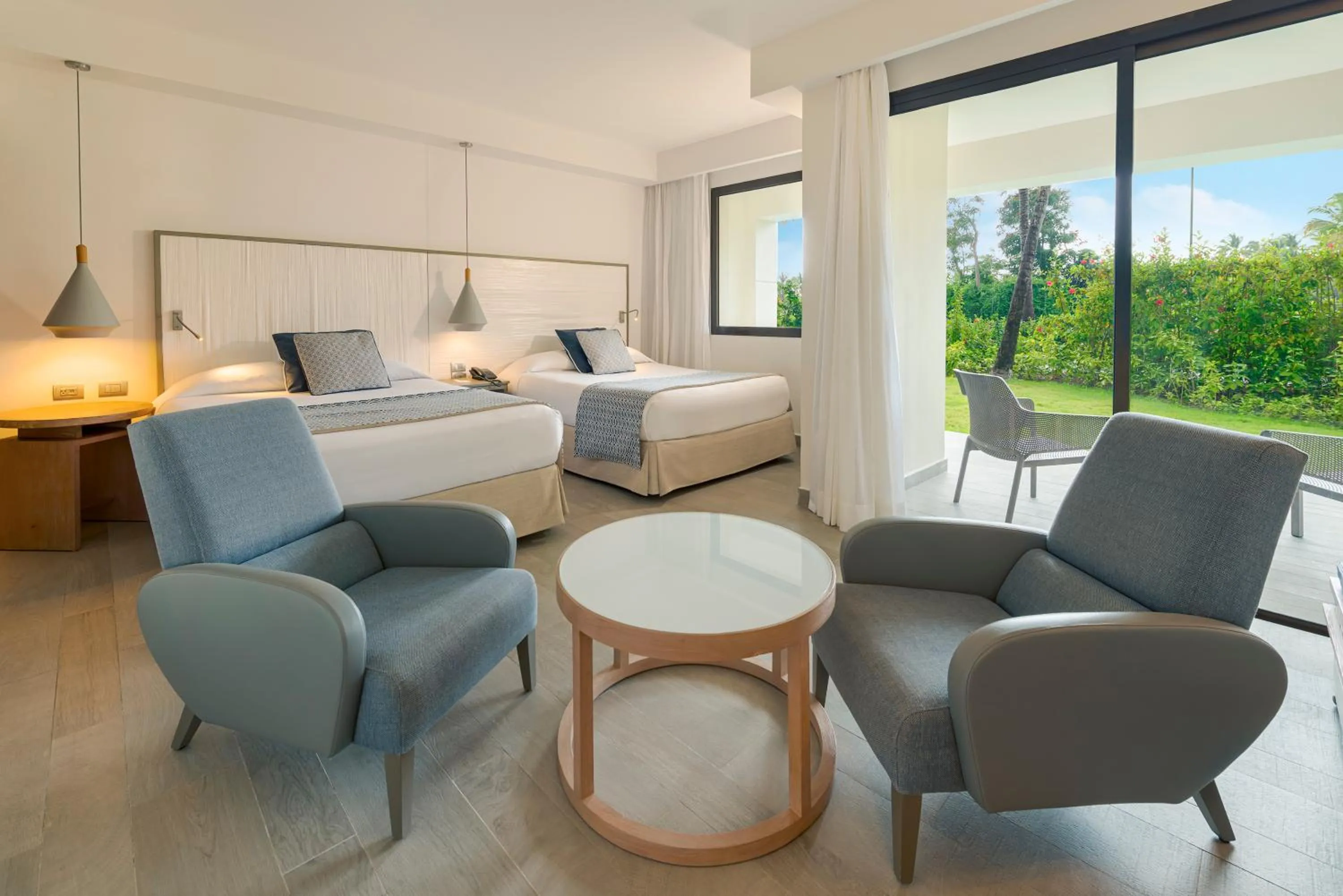 Living room, Bed in Catalonia Punta Cana - All Inclusive