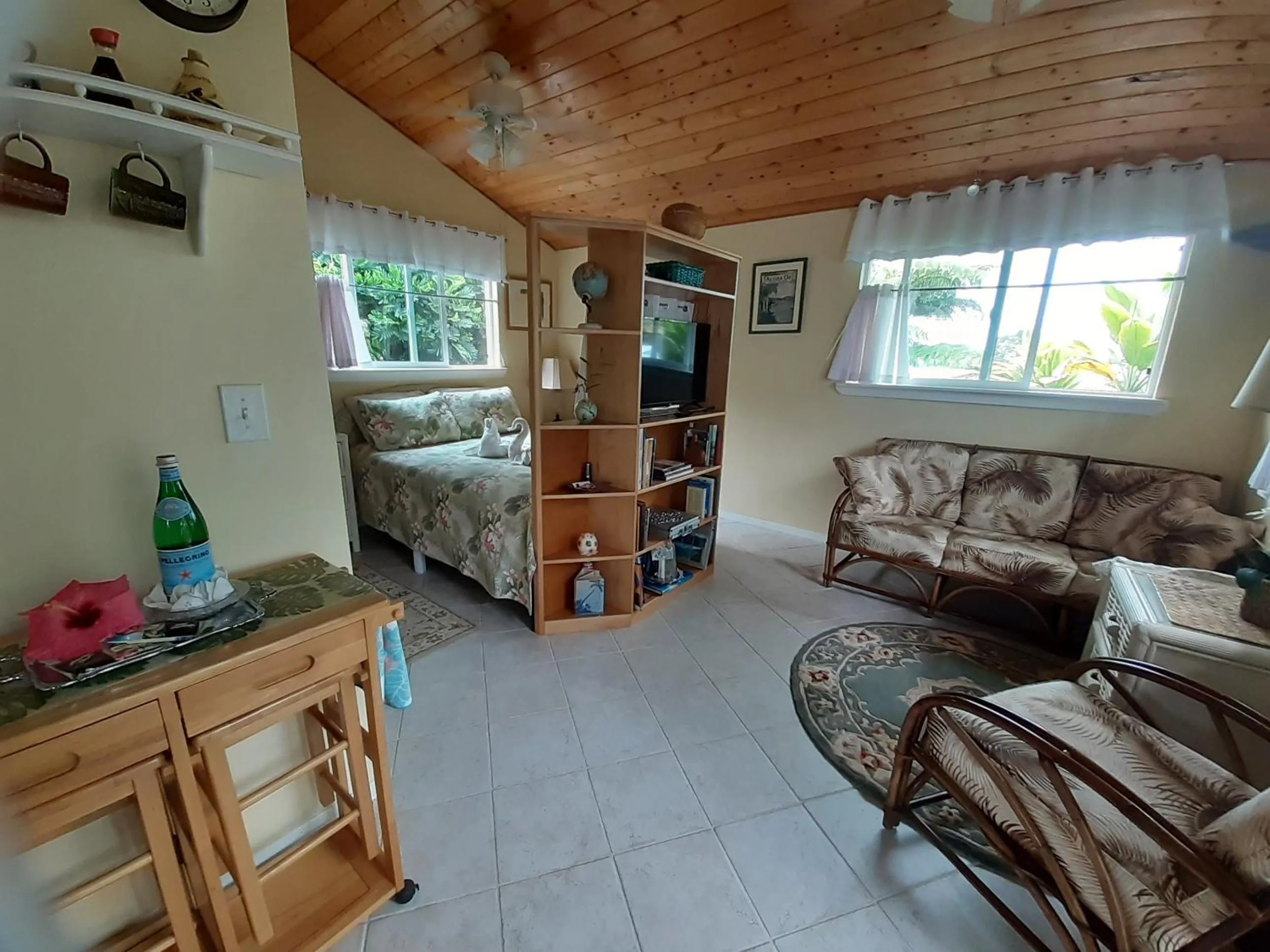 Living room, Bed in Paradise Cottage at Anthurium Hale