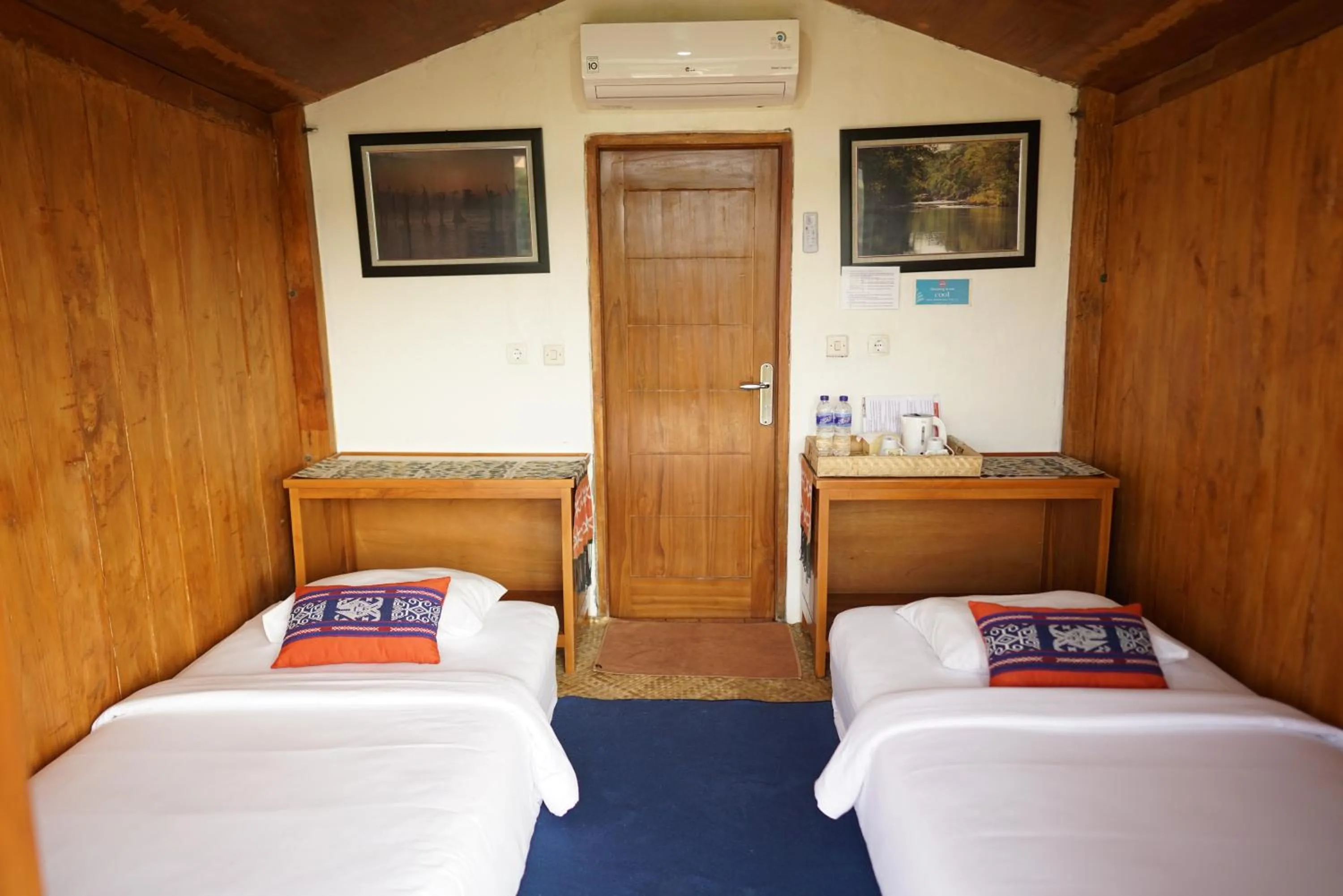 Bed in Morinda Villa and Resto