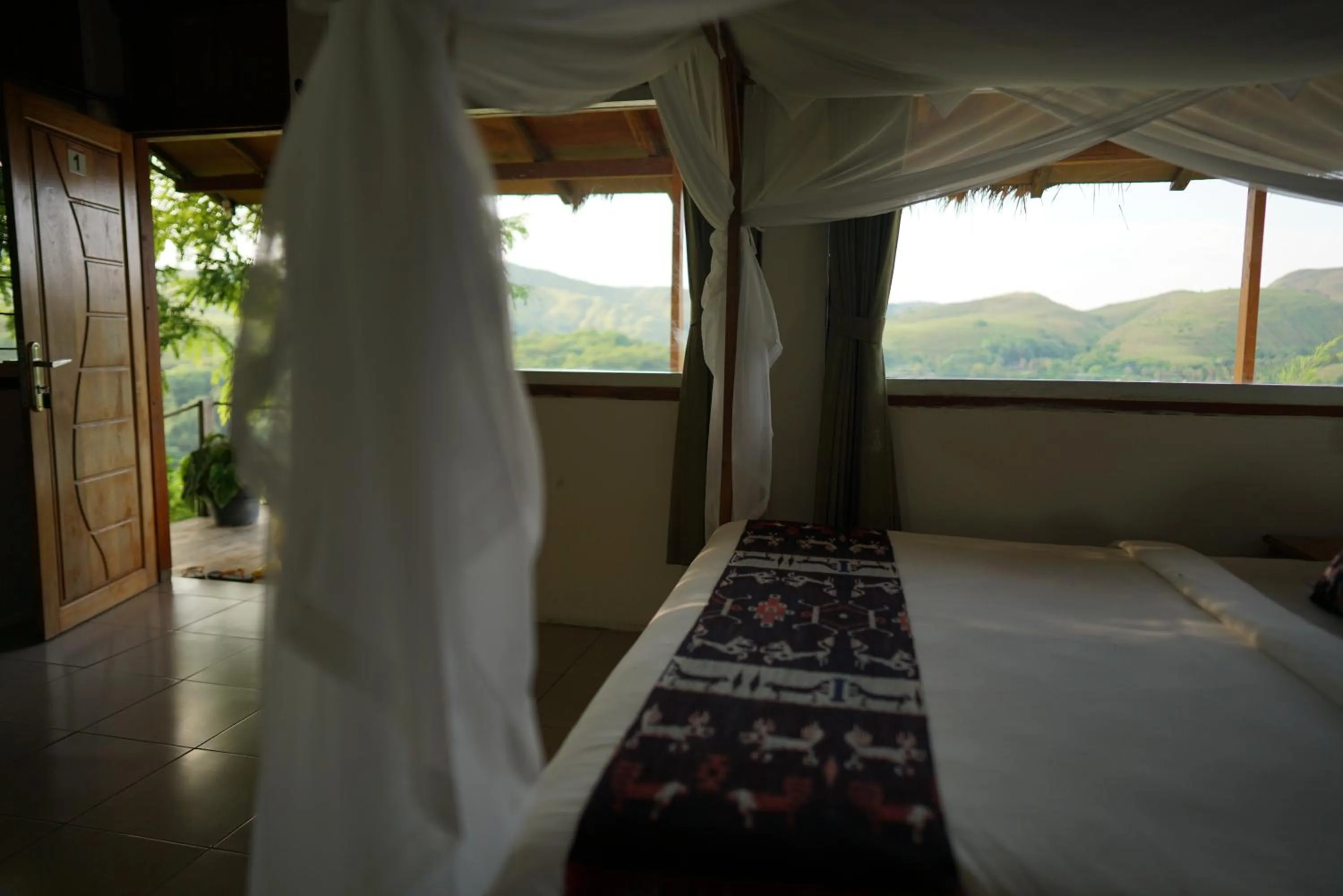 Bed in Morinda Villa and Resto