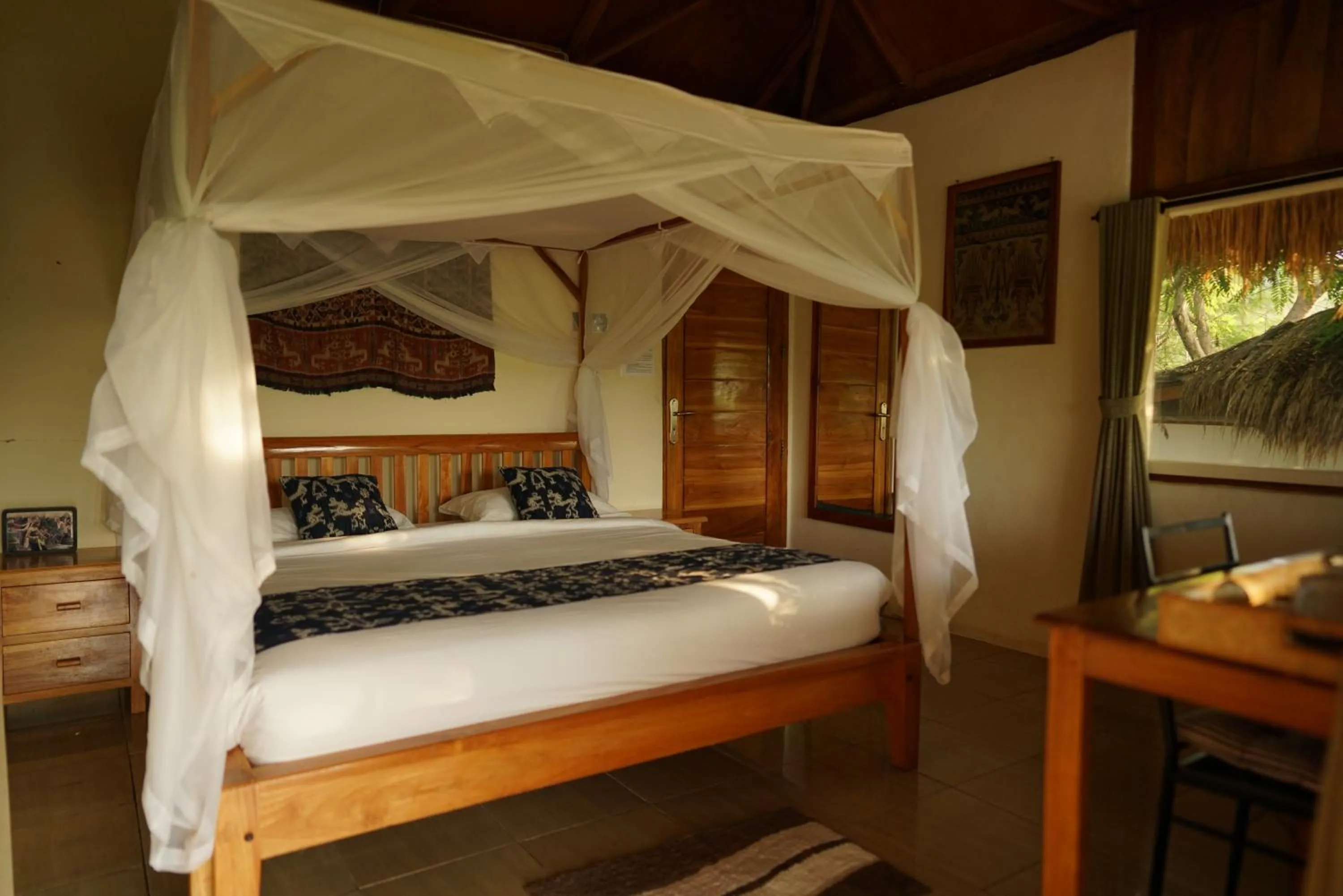 Bed in Morinda Villa and Resto