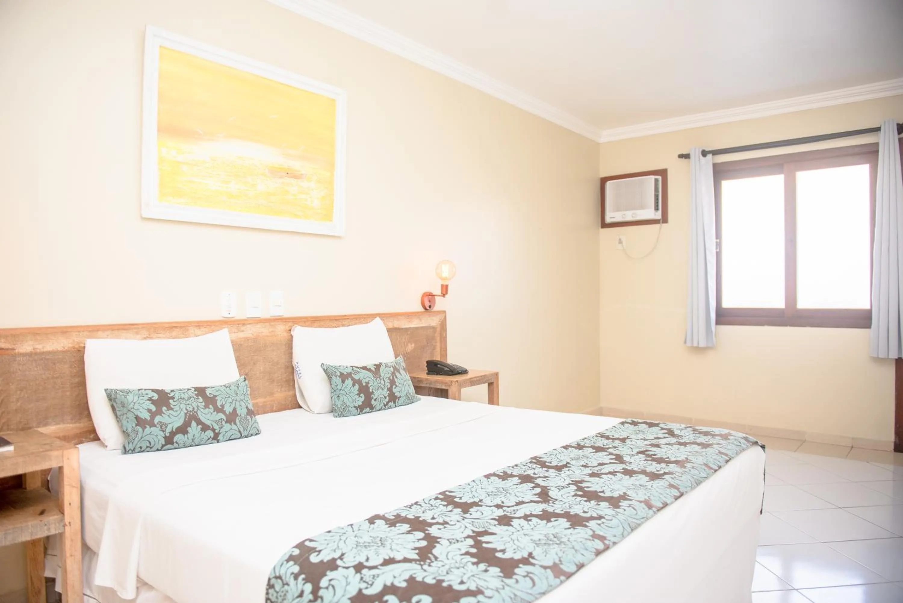 Bed in Hotel Don Quijote Búzios