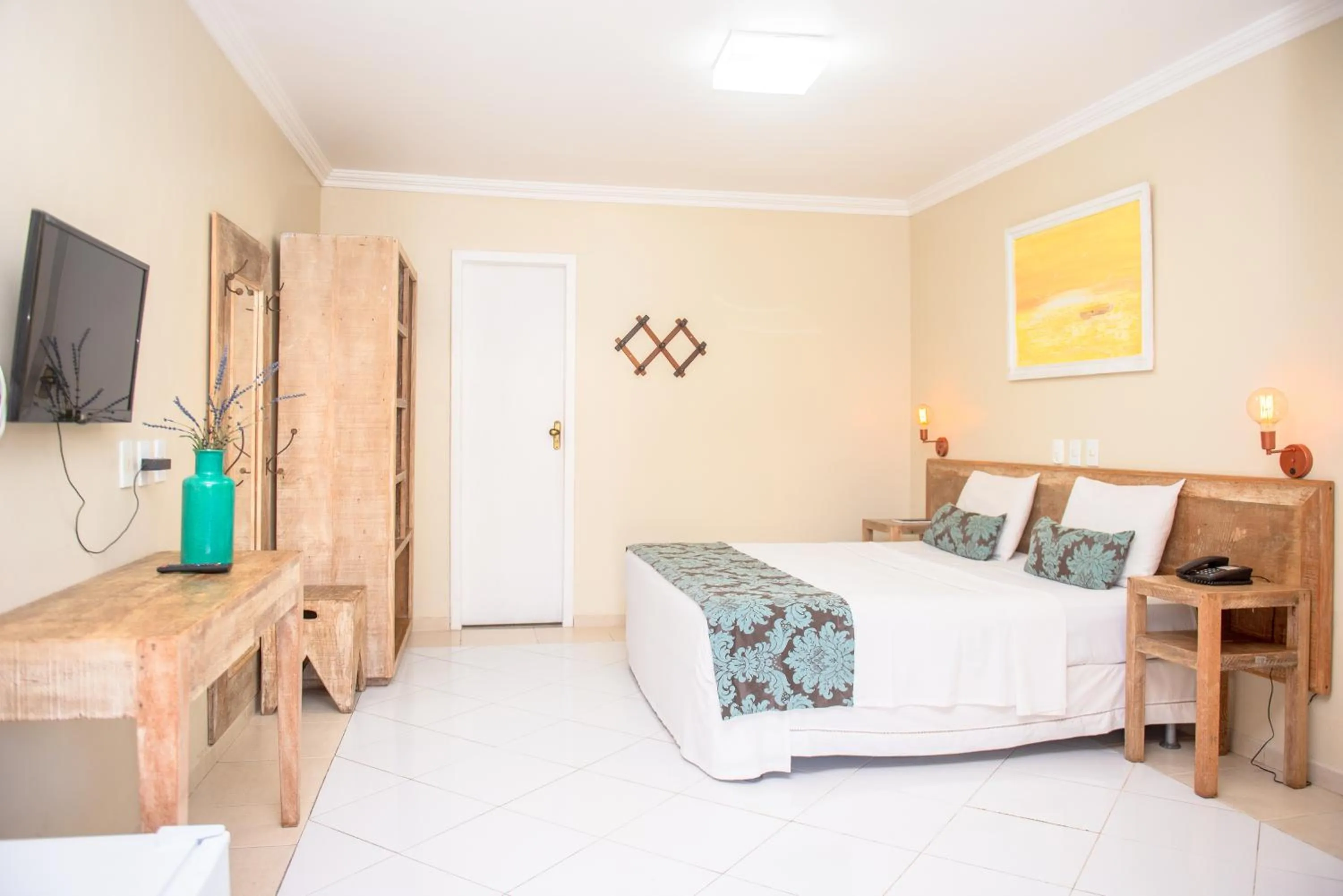 Bed in Hotel Don Quijote Búzios