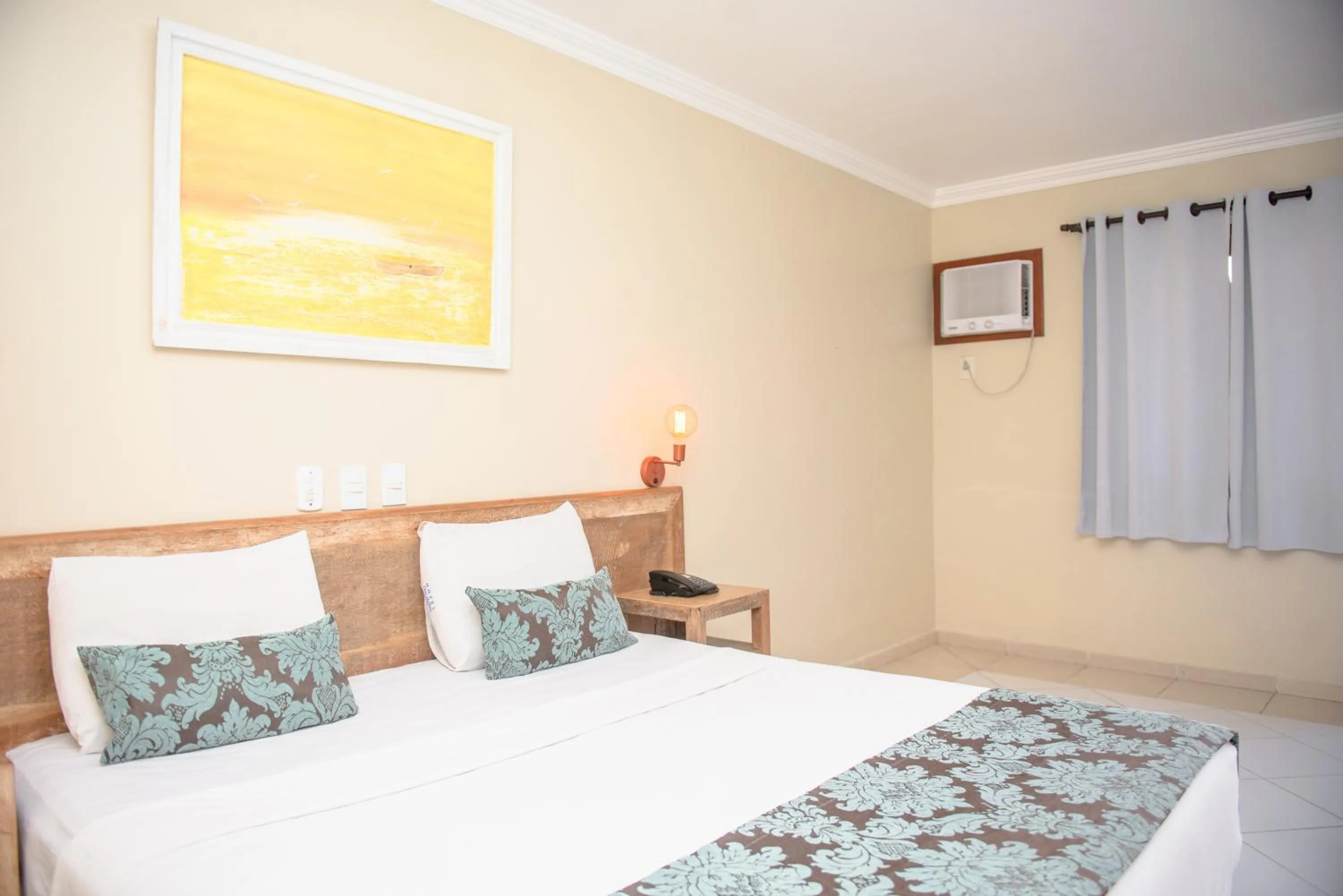 Bed in Hotel Don Quijote Búzios