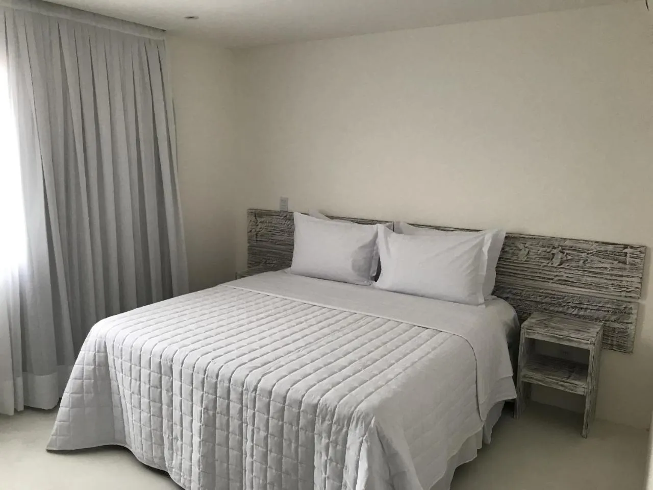 Bed in Girassóis Suítes