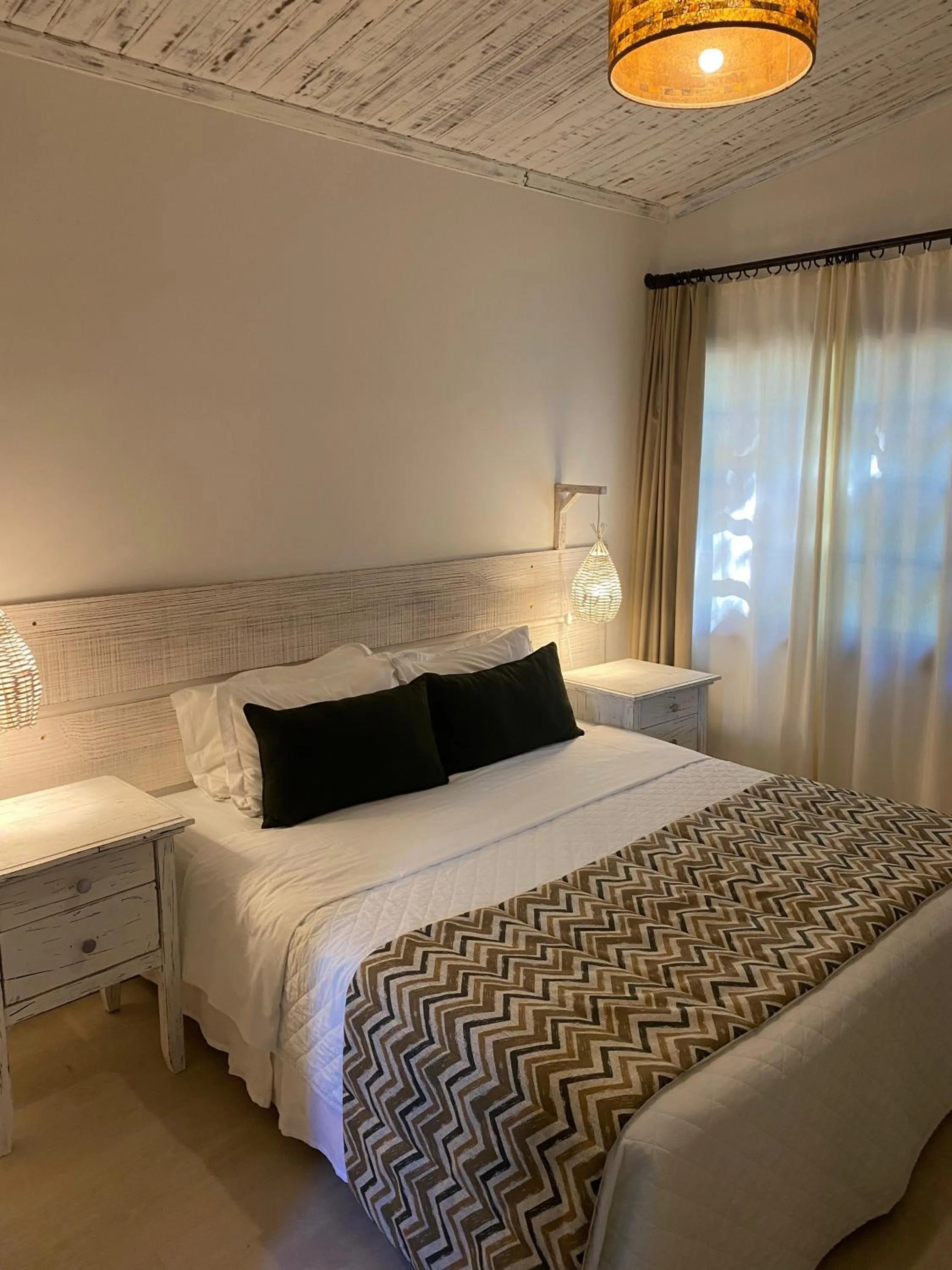 Bed in Girassóis Suítes