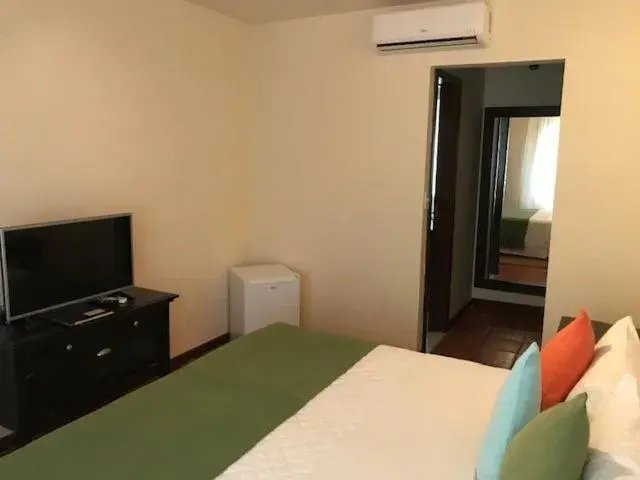 Bed in Pousada dos Girassóis Bed in Pousada dos Girassóis