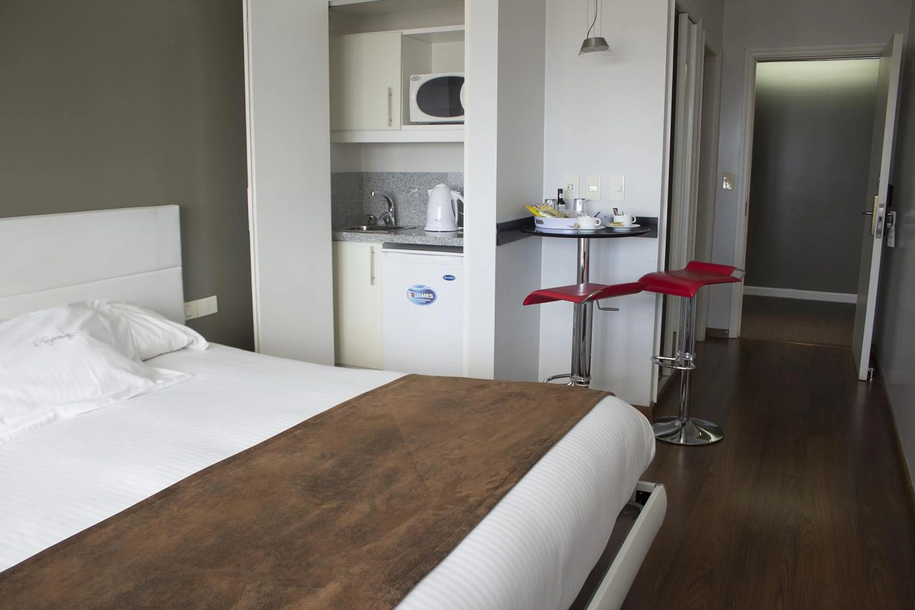 Photo of the whole room, Bed in Regency Golf - Hotel Urbano