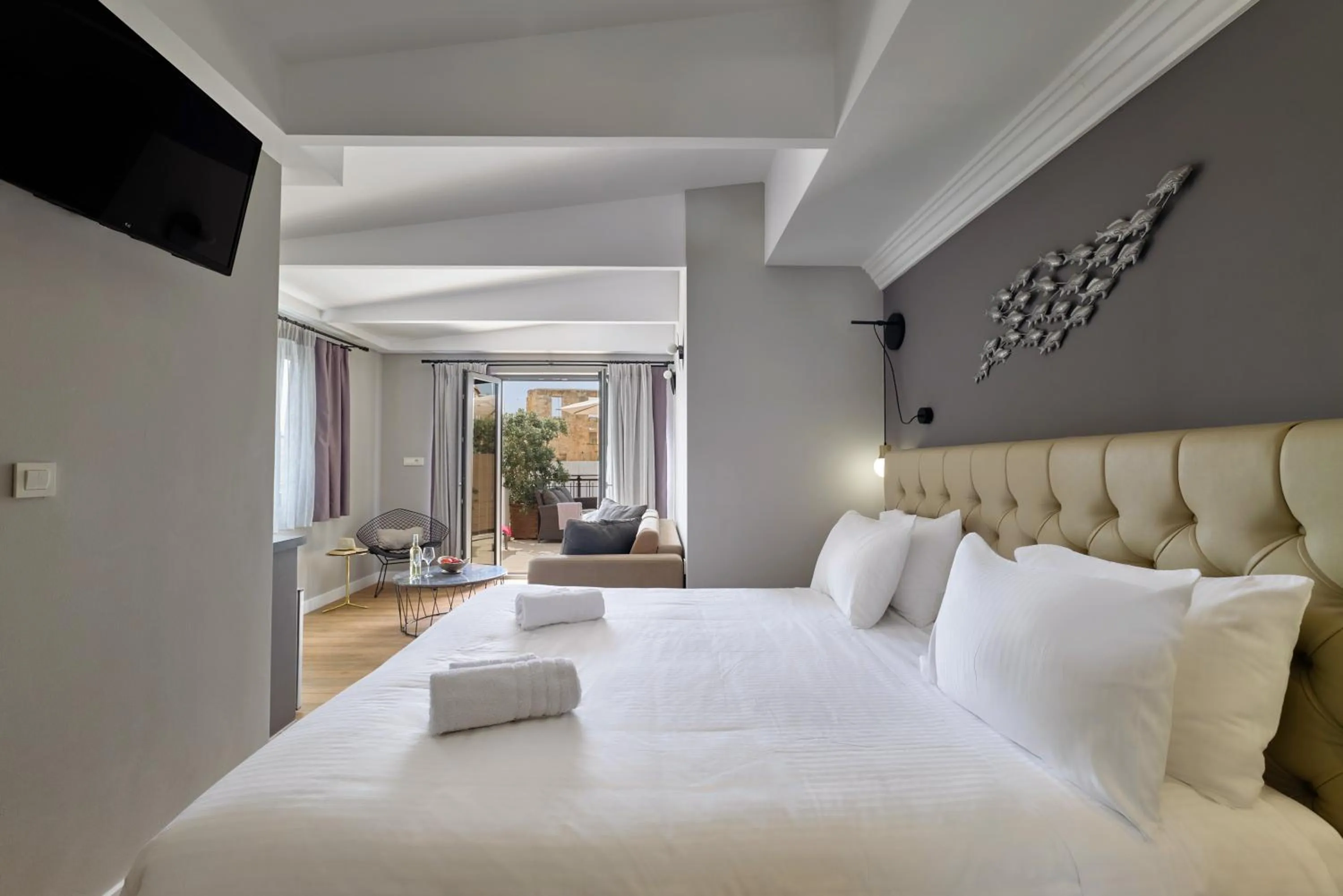 Bed in Nival Luxury Suites