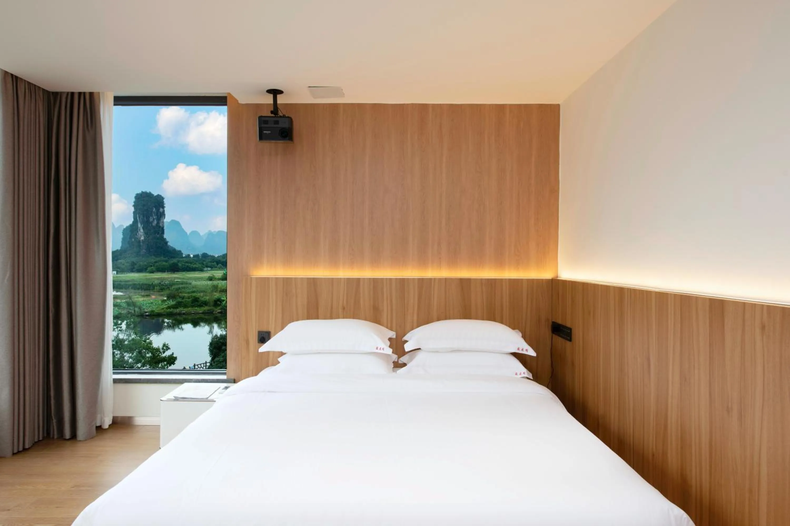 Bed in Yangshuo Hidden Dragon Villa