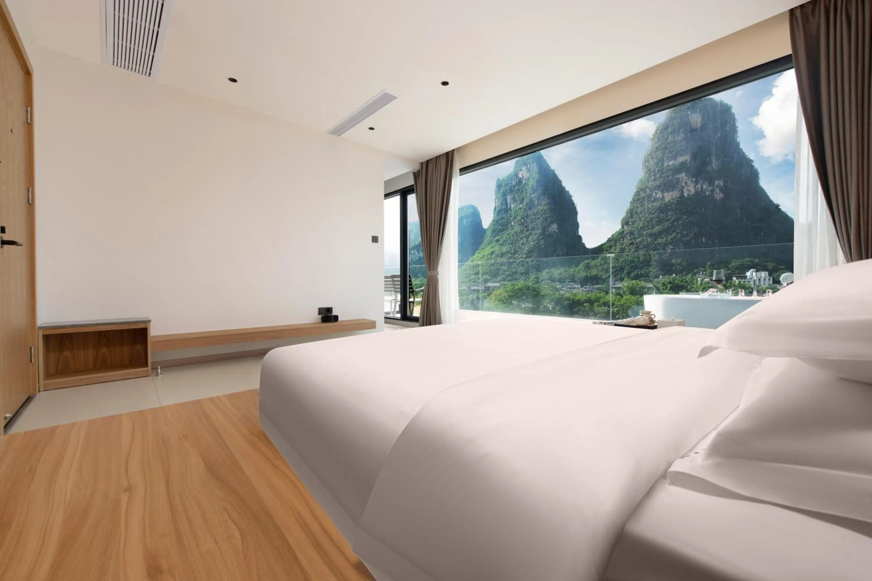Bed in Yangshuo Hidden Dragon Villa