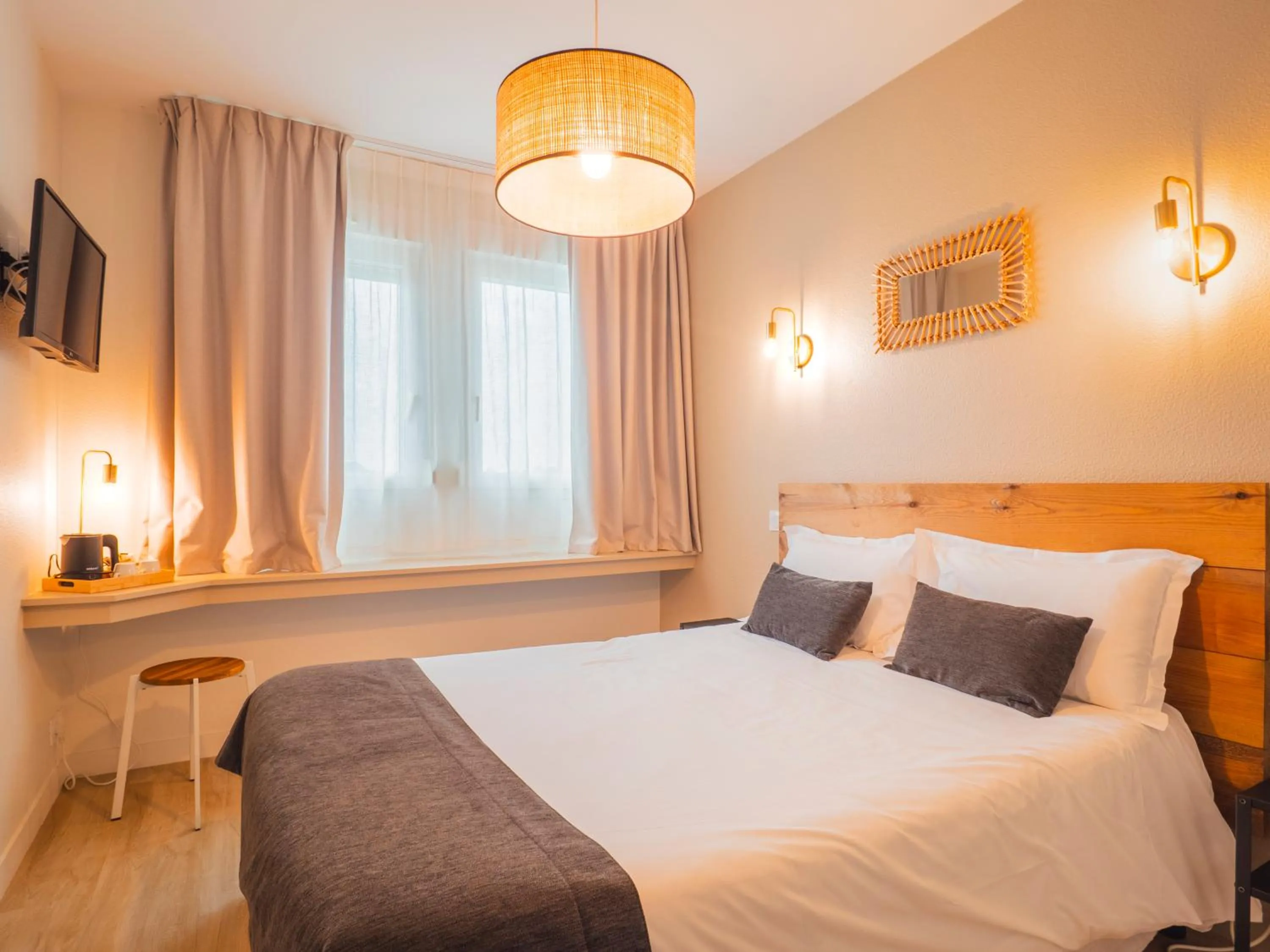 Bed in Hotel La Licorne