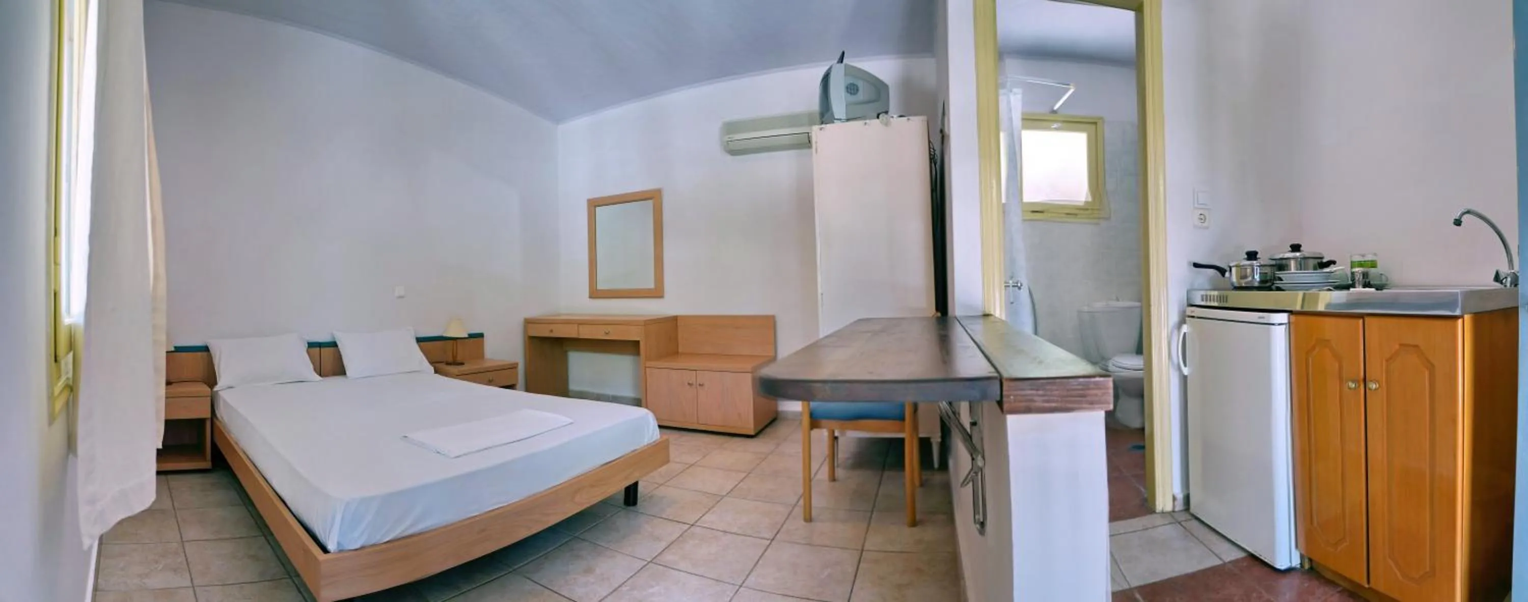 Toilet, Bed in Pefka Rooms