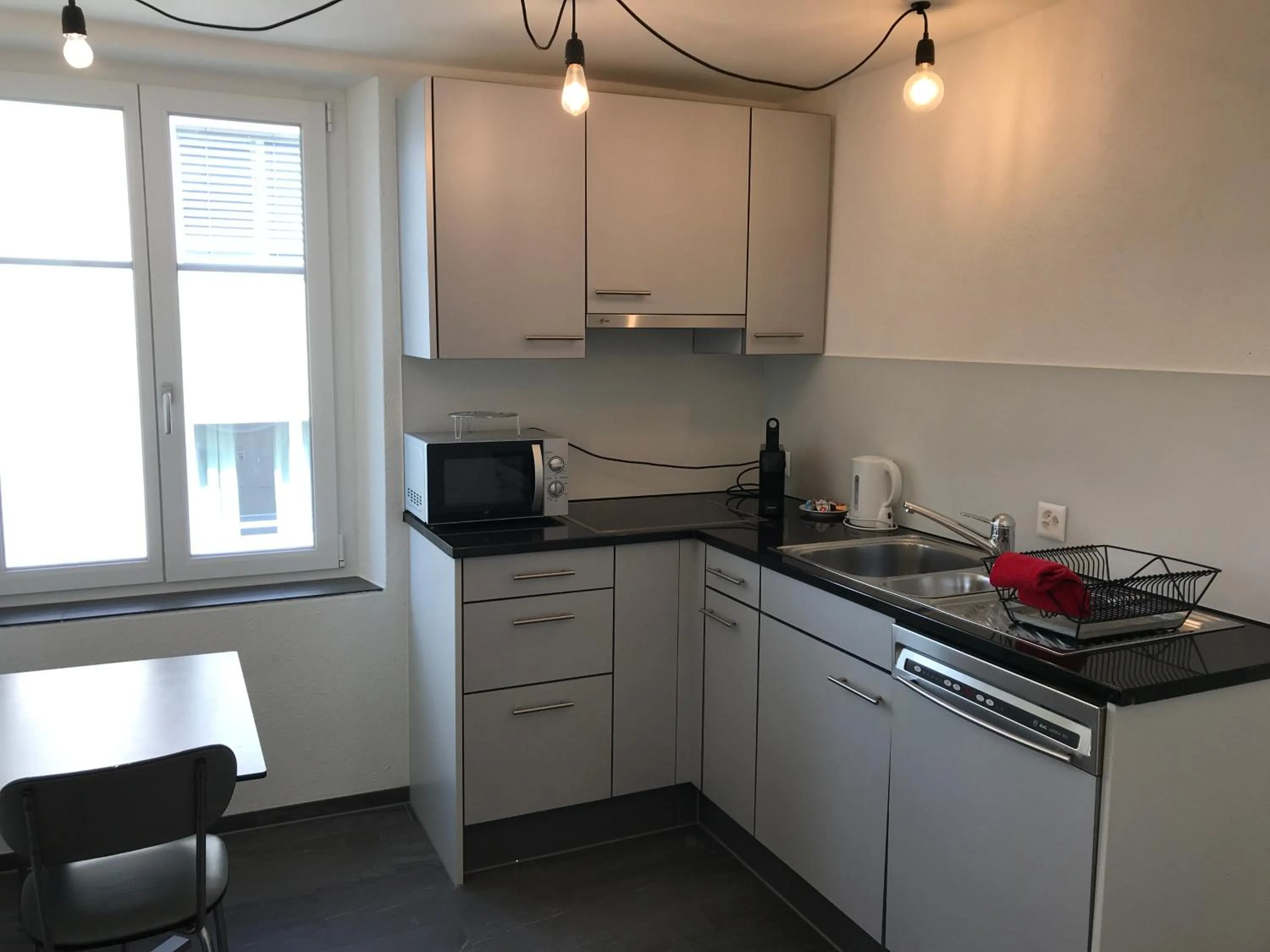 Kitchen or kitchenette in Hotel Tilia - Self Check-in