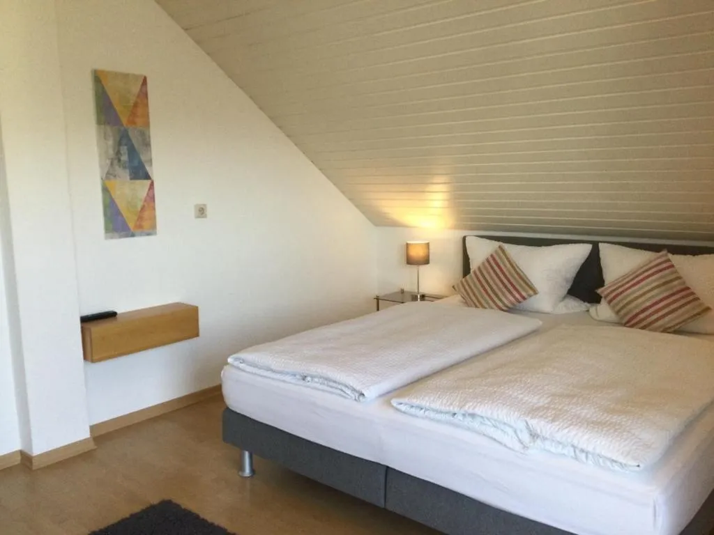 Bed in Gästehaus Am Rebenhang