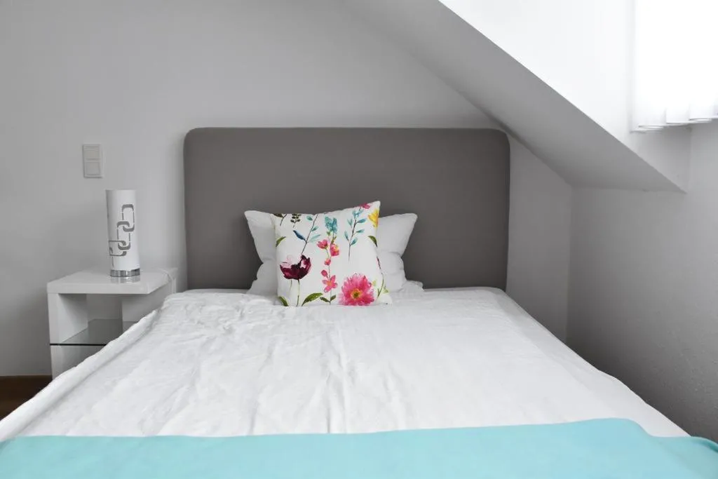 Bed in Gästehaus Am Rebenhang