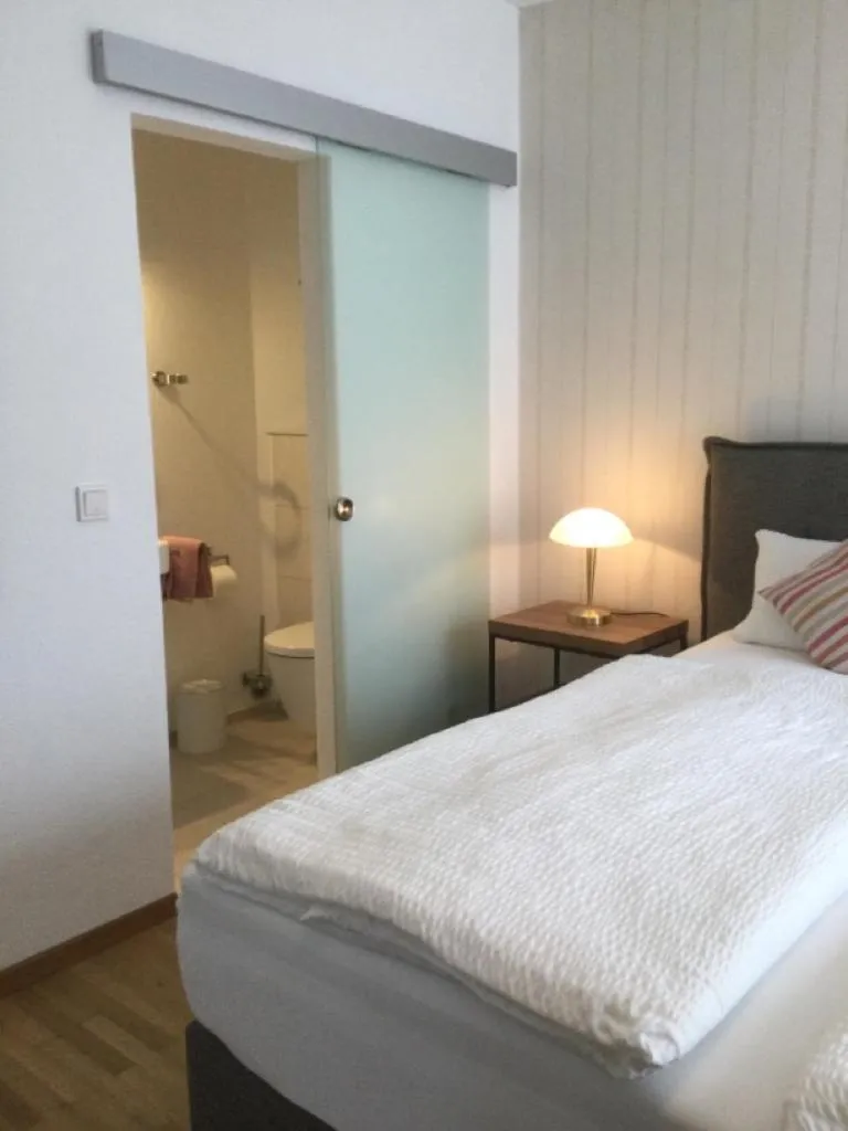 Photo of the whole room, Bed in Gästehaus Am Rebenhang