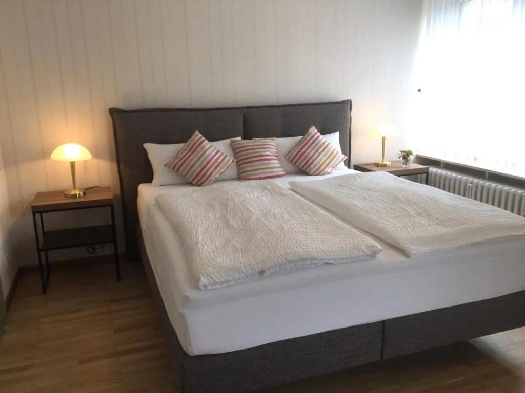 Photo of the whole room, Bed in Gästehaus Am Rebenhang