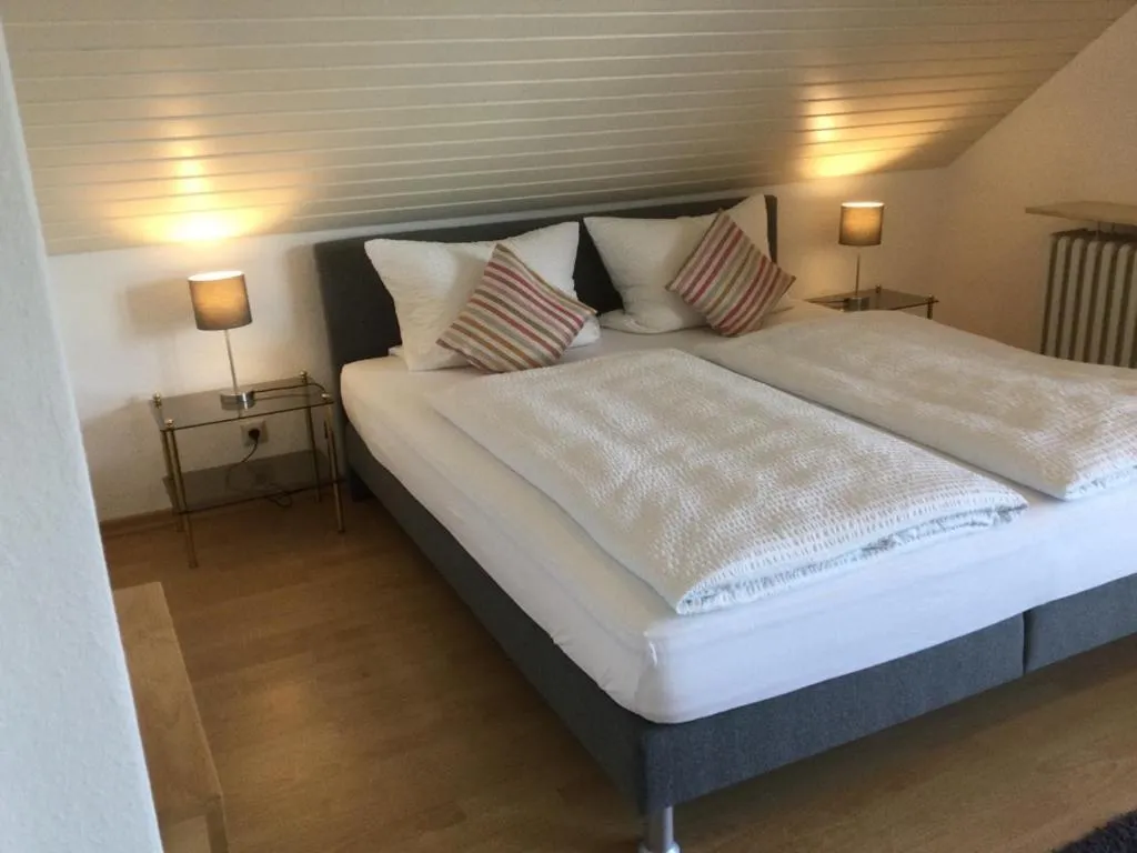 Bed in Gästehaus Am Rebenhang