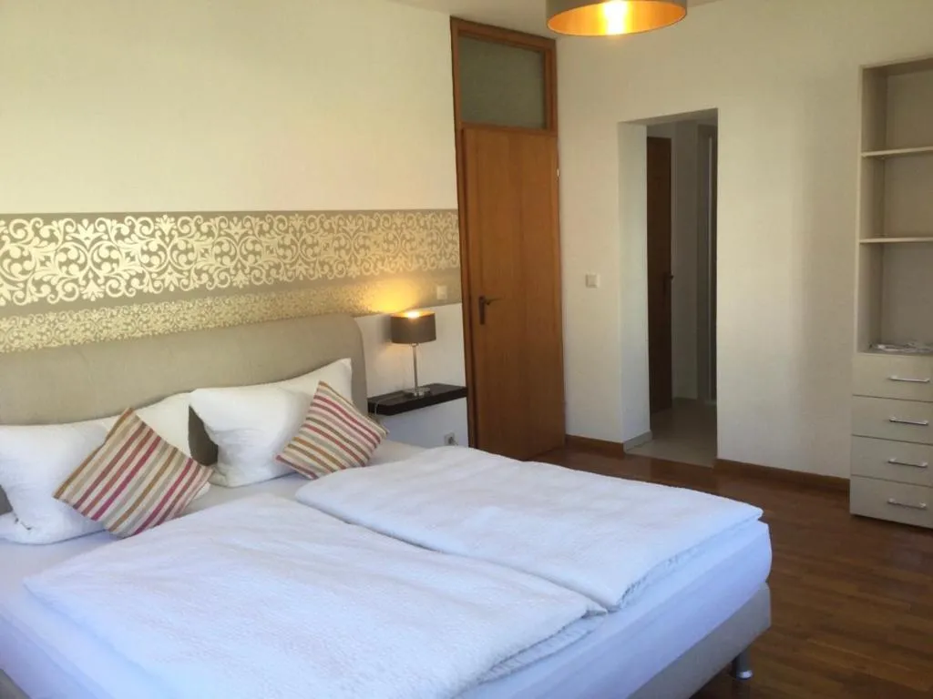 Photo of the whole room, Bed in Gästehaus Am Rebenhang