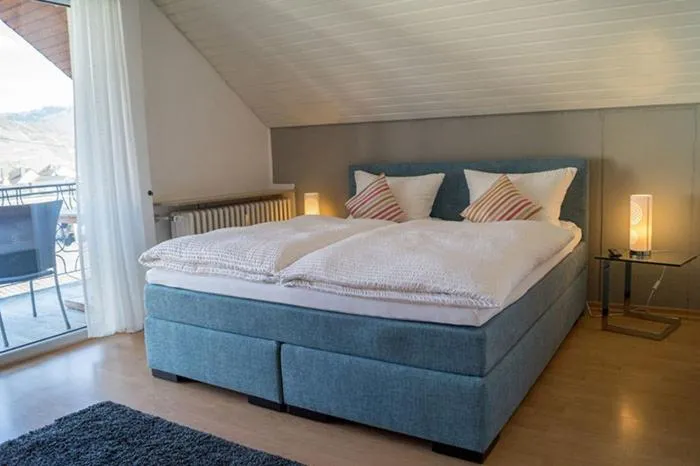 Bed in Gästehaus Am Rebenhang