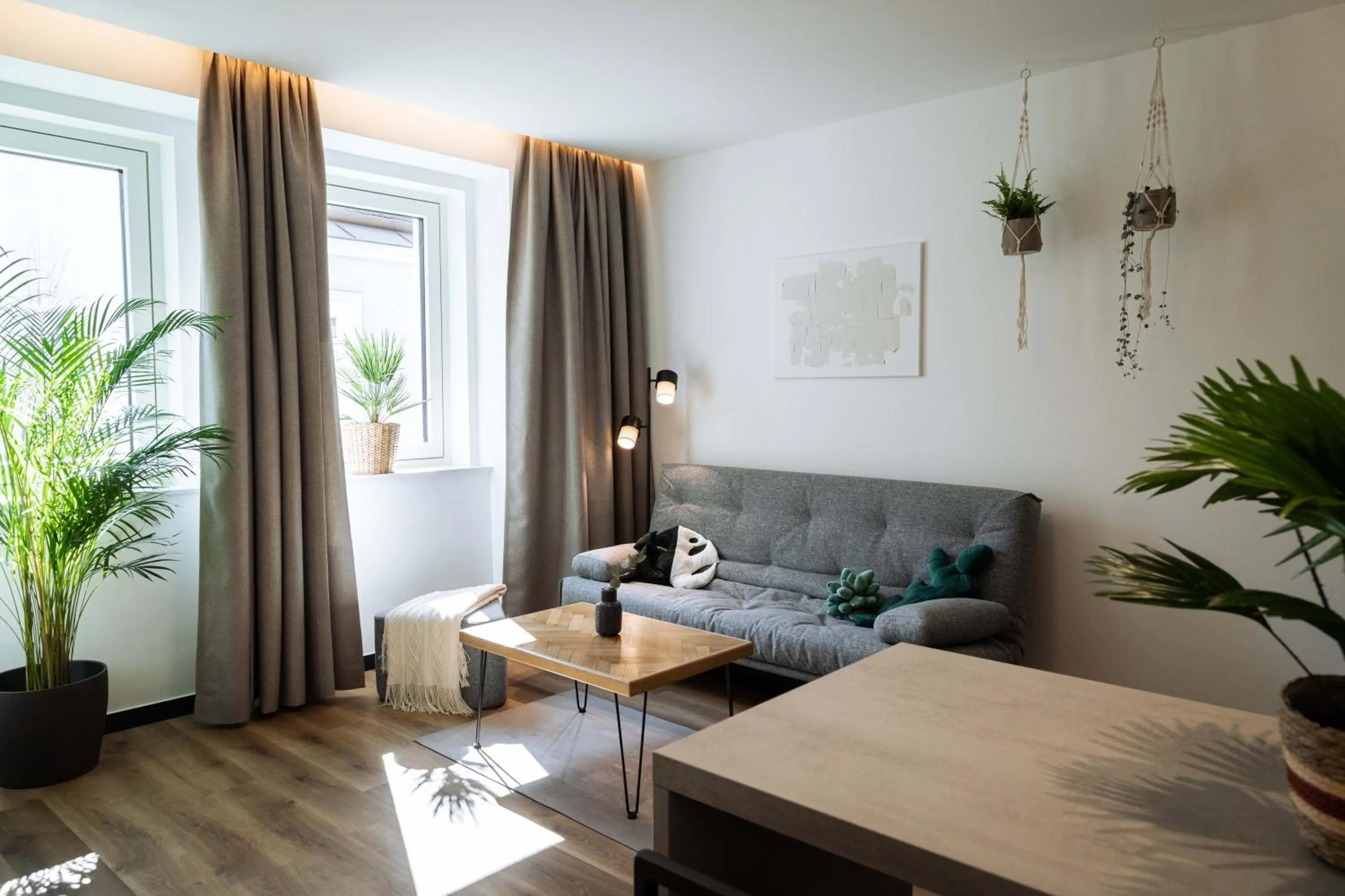 Living room in Urban Jungle Apartments