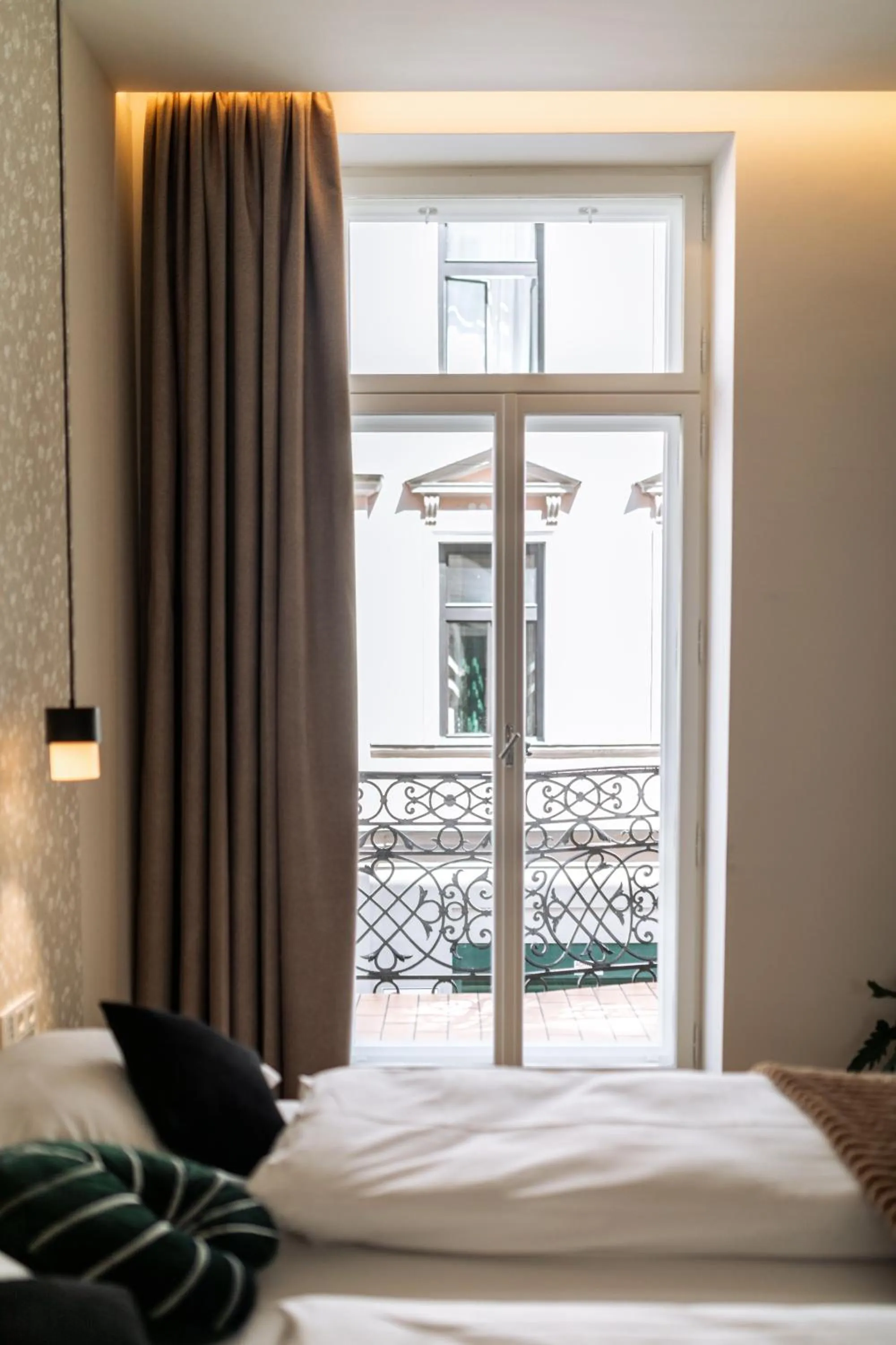 Balcony/Terrace, Bed in Urban Jungle Apartments