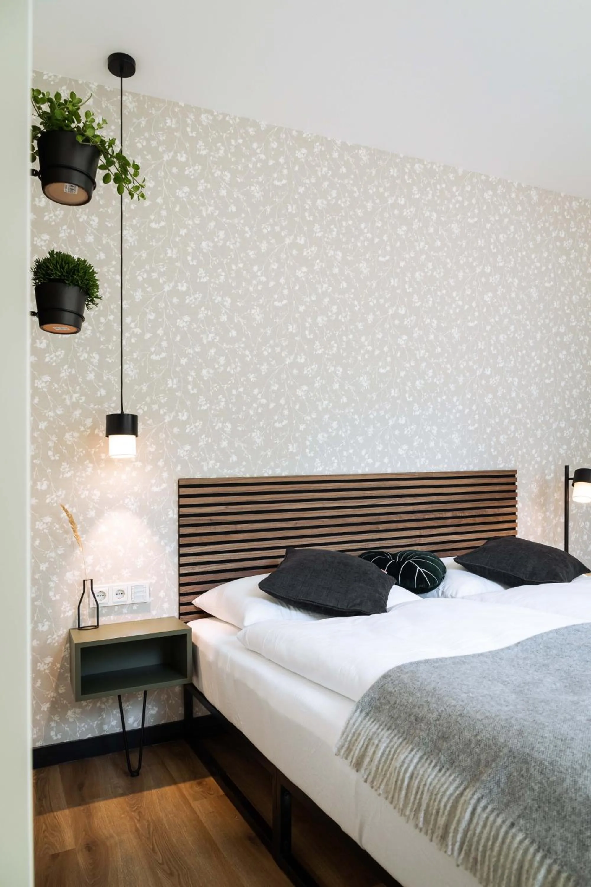 Bed in Urban Jungle Apartments