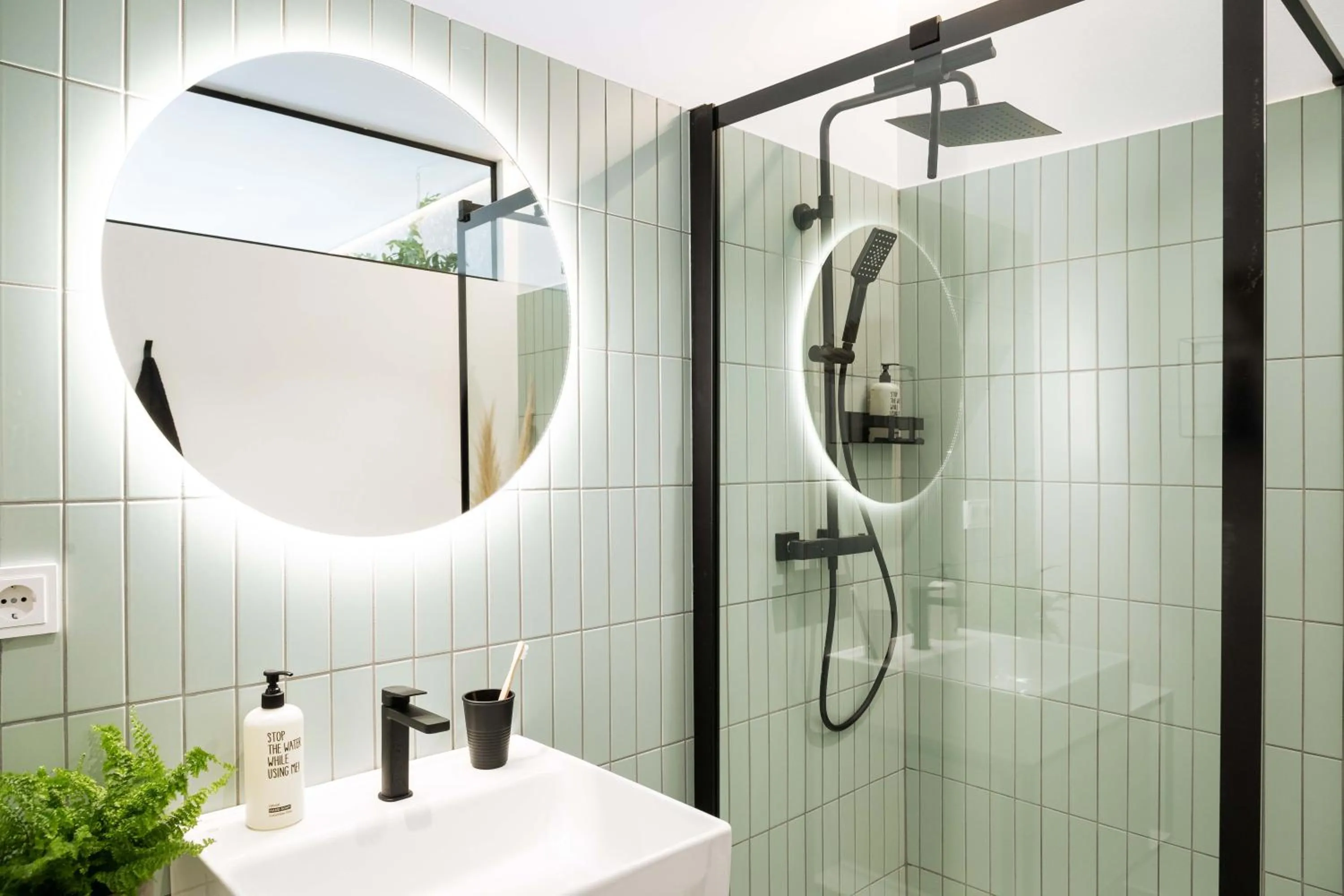 Shower in Urban Jungle Apartments