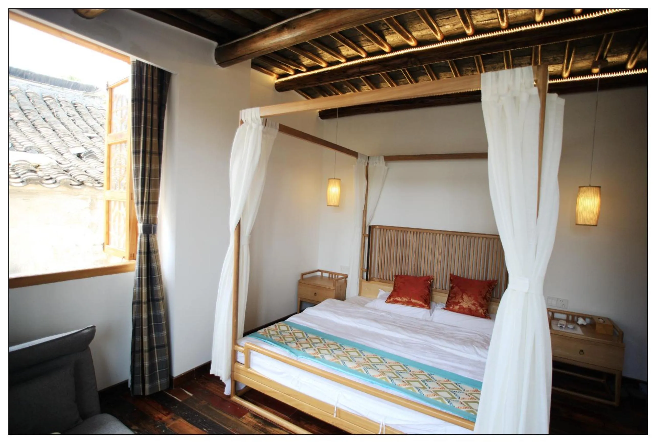 Bed in Tongli Begonia Flowers Guesthouse