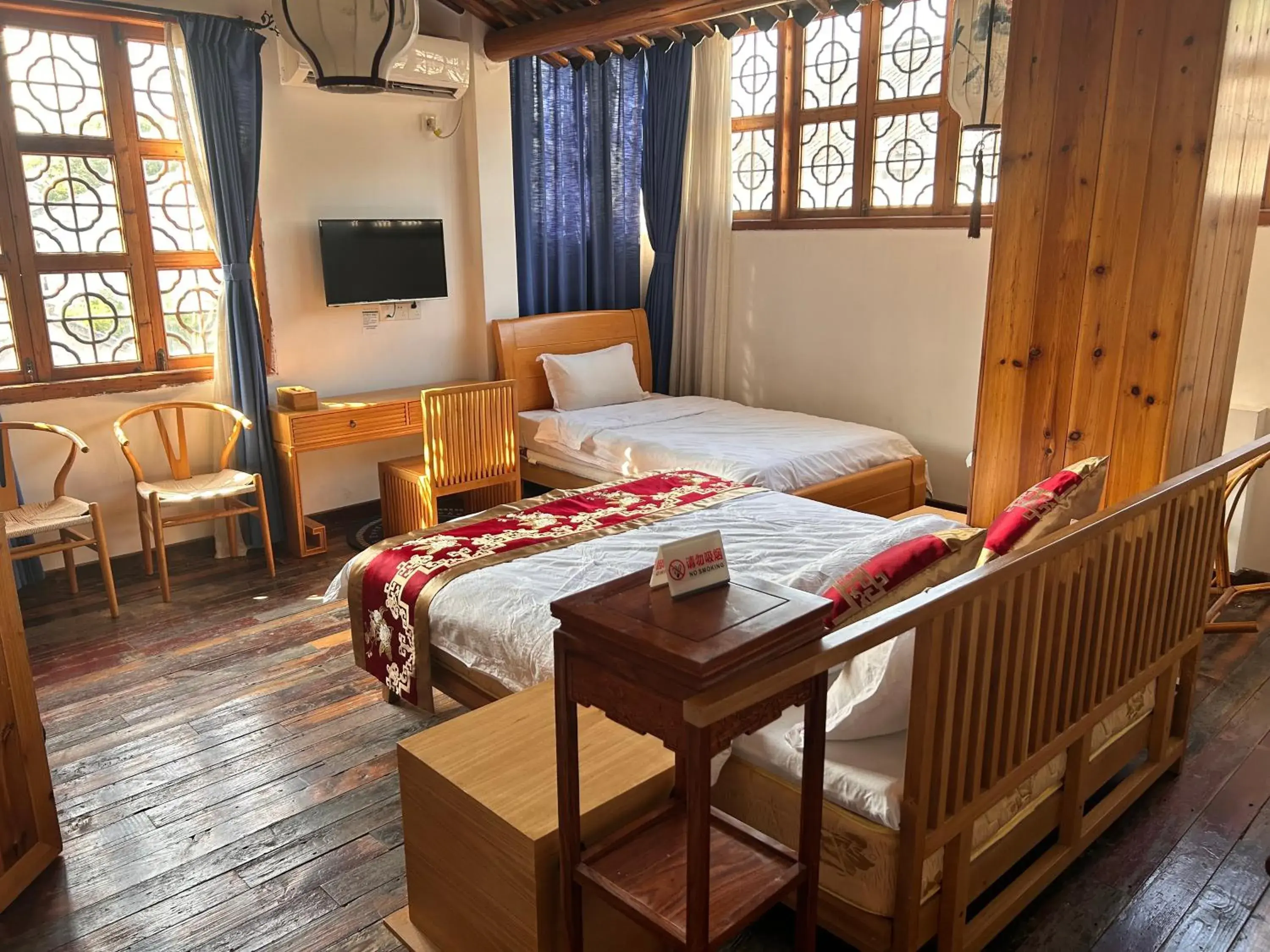 Bed in Tongli Begonia Flowers Guesthouse Bed in Tongli Begonia Flowers Guesthouse