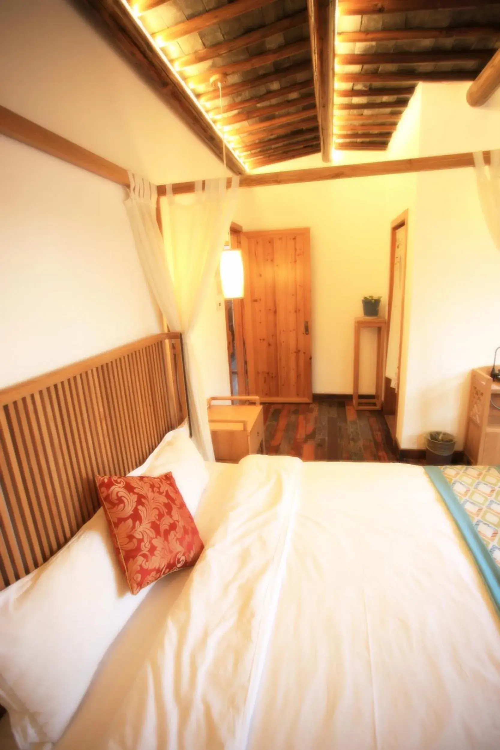 Bed in Tongli Begonia Flowers Guesthouse Bed in Tongli Begonia Flowers Guesthouse