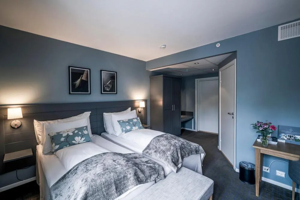 Photo of the whole room, Bed in Gloppen Hotell - by Classic Norway Hotels