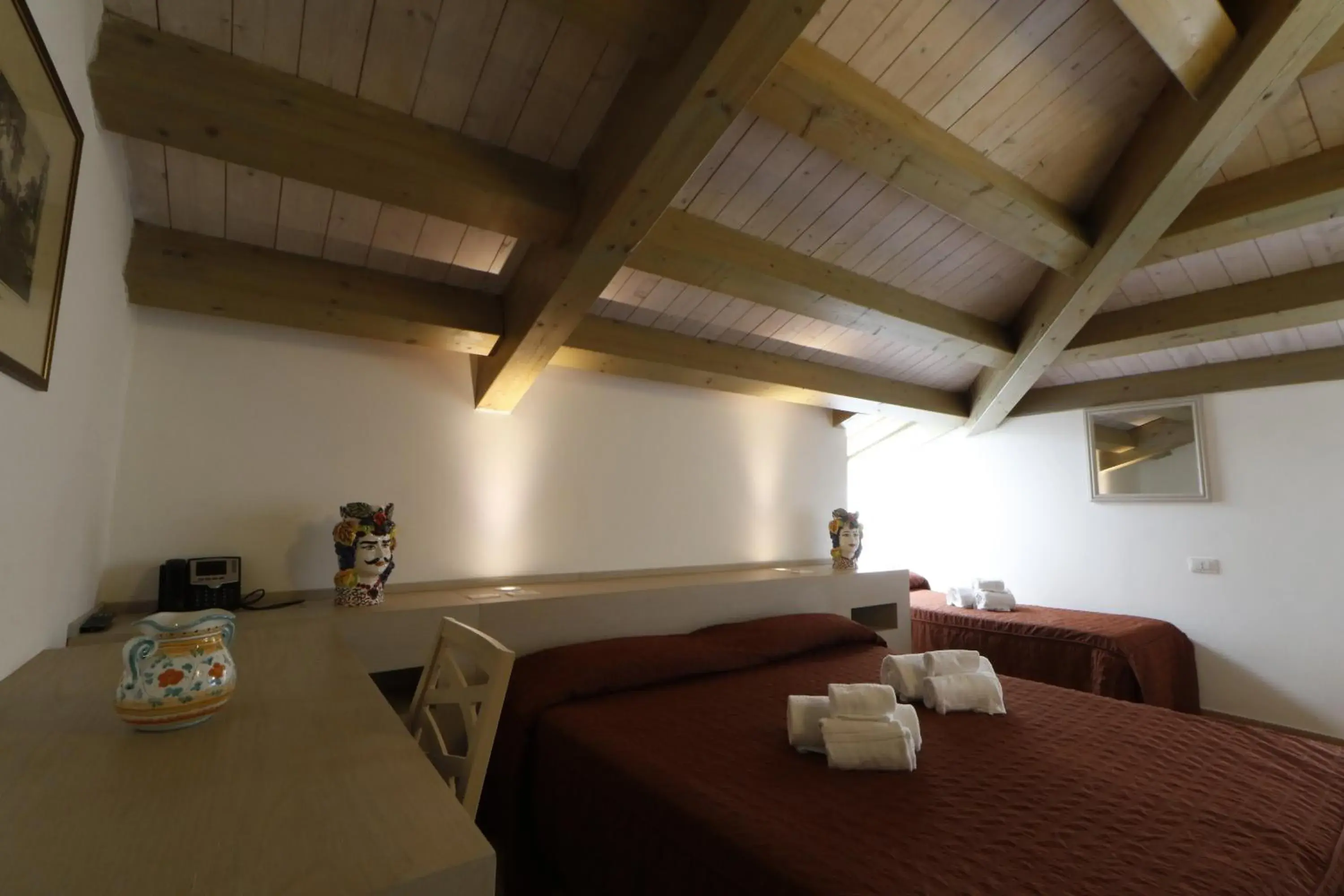 Quadruple Room in Hotel Villa Fanusa Quadruple Room in Hotel Villa Fanusa