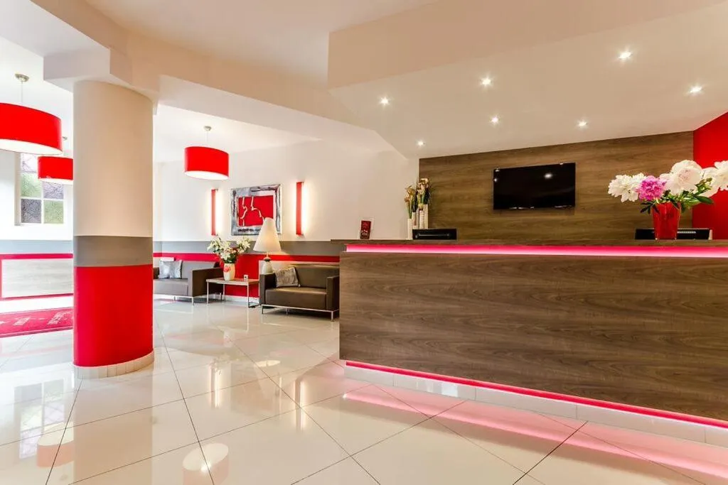 Lobby or reception in Hôtel Saint Louis de France