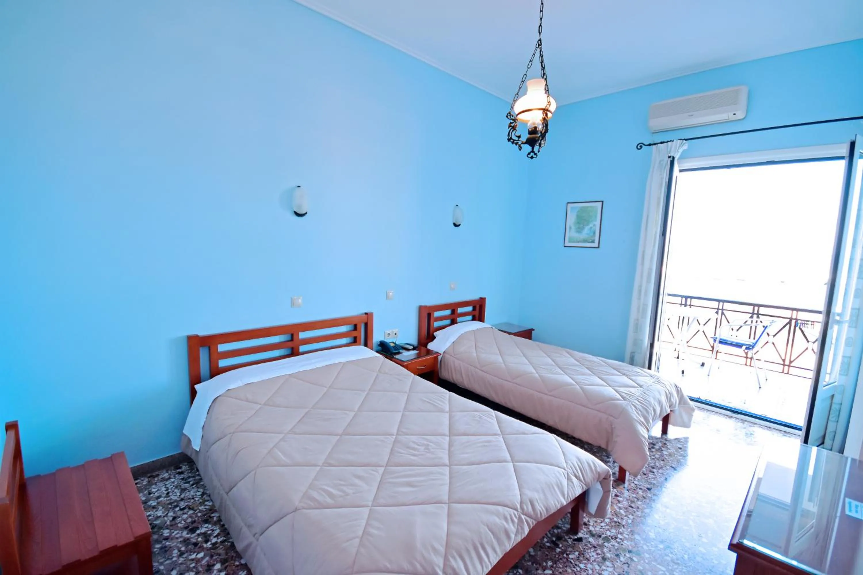Bed in Hotel Blue Sea