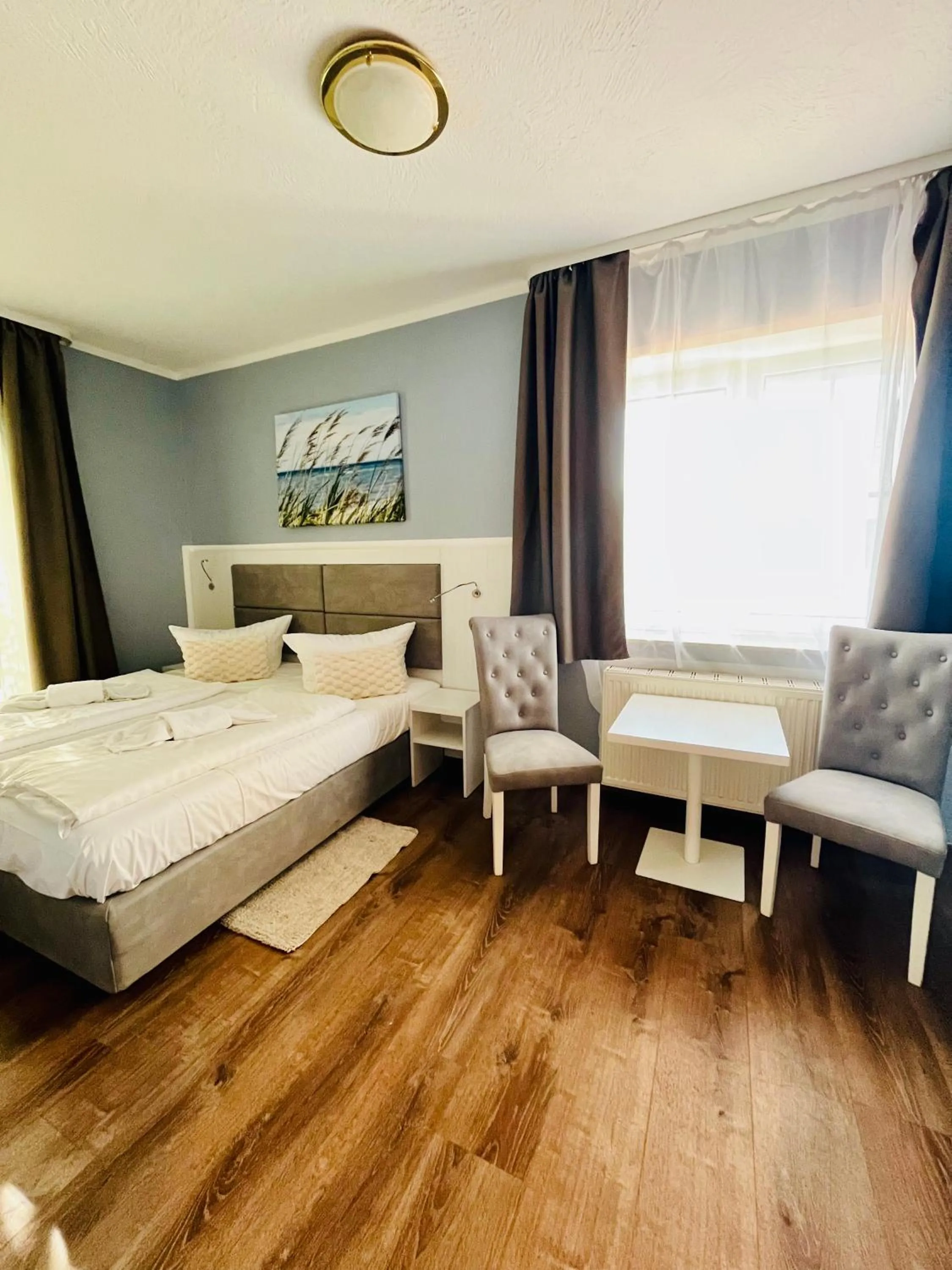 Bed in Strandhotel Vier Jahreszeiten Buckow