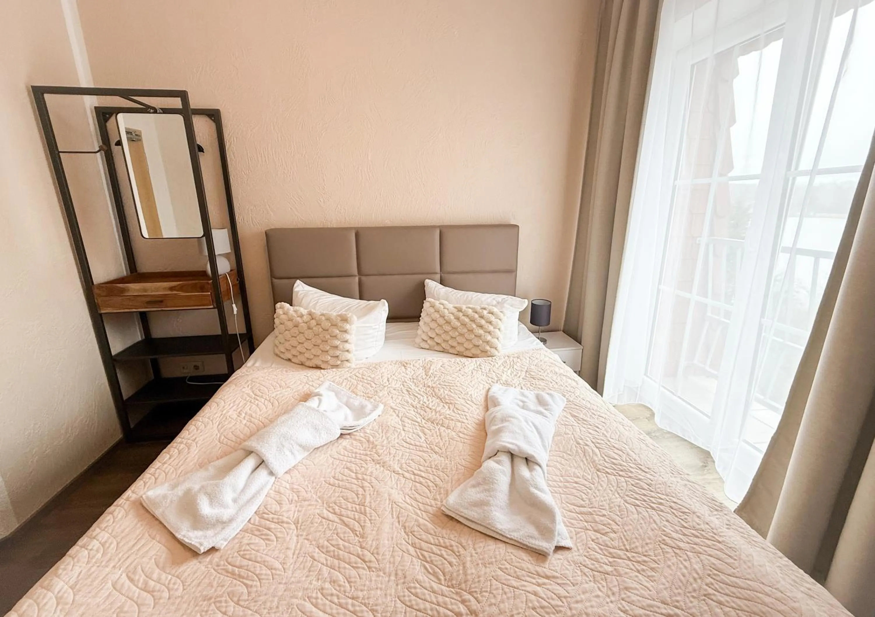 Bed in Strandhotel Vier Jahreszeiten Buckow