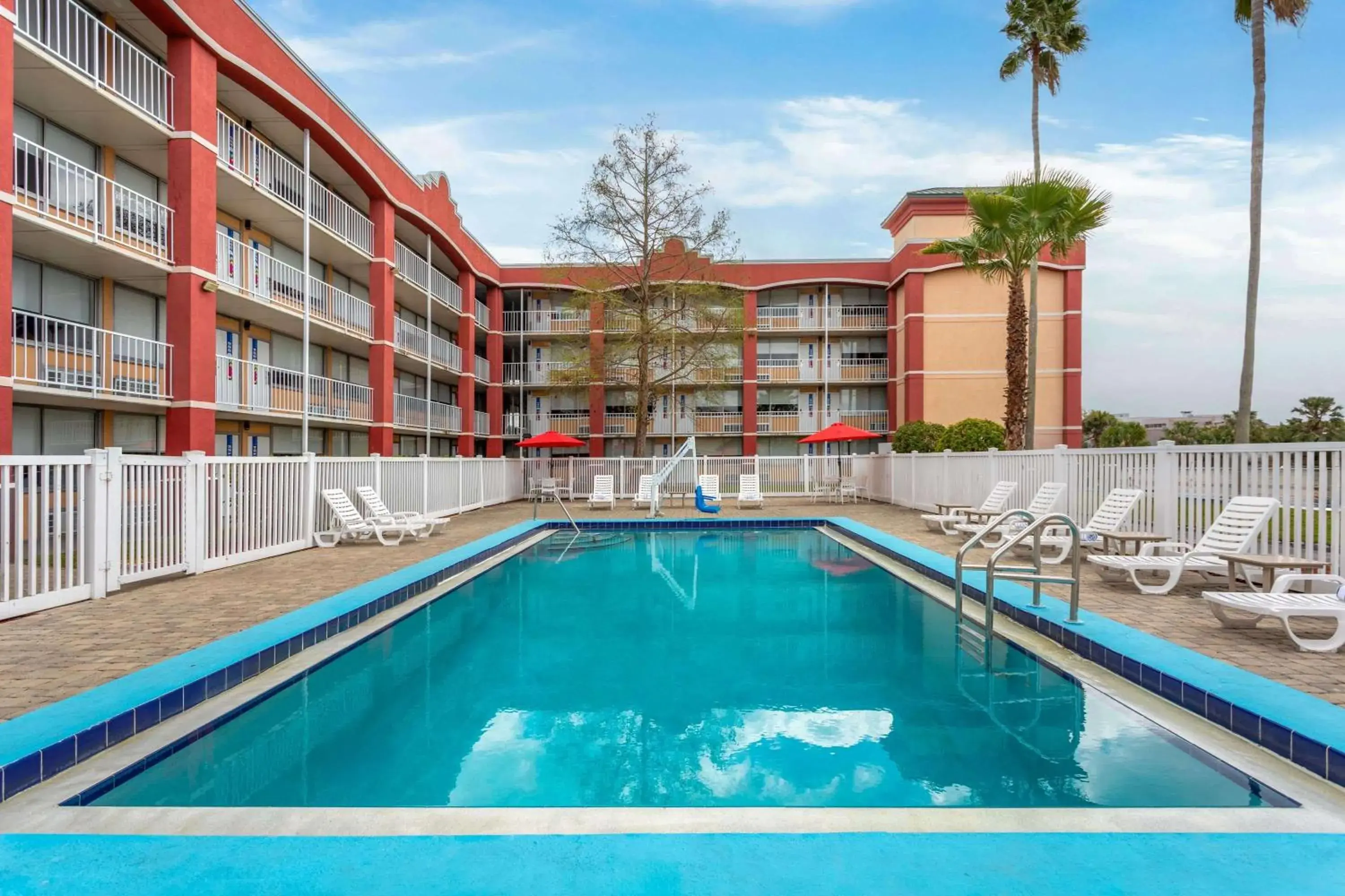 Pool view in Baymont by Wyndham Orlando North Millenia Pool view in Baymont by Wyndham Orlando North Millenia