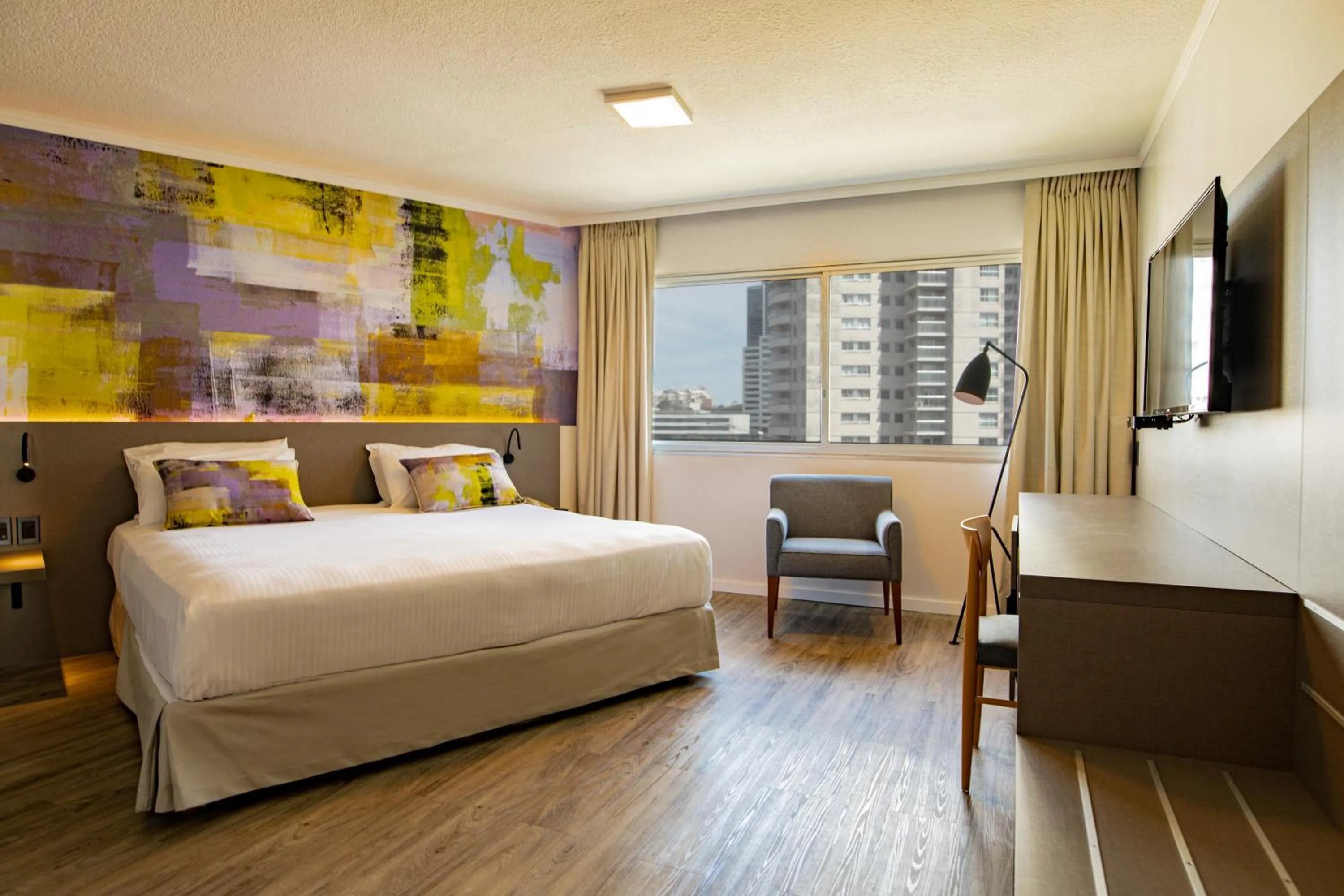 Bed in Palladium Business Hotel